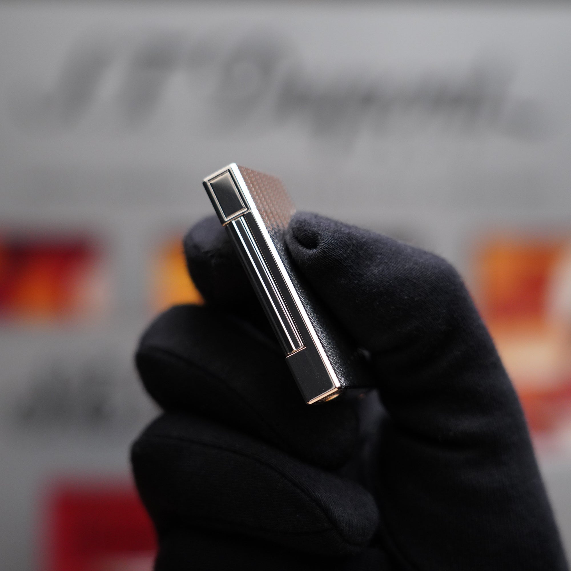 A person is holding a Vintage 1980 S.T. Dupont Ligne D Heavy Silver Plated Fine Wave Type Lighter.