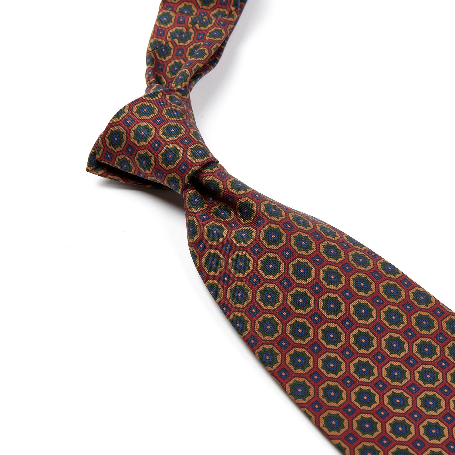 A KirbyAllison.com Sovereign Grade Crimson/Green Floral Medallion Ancient Madder Tie, inspired by the United Kingdom.