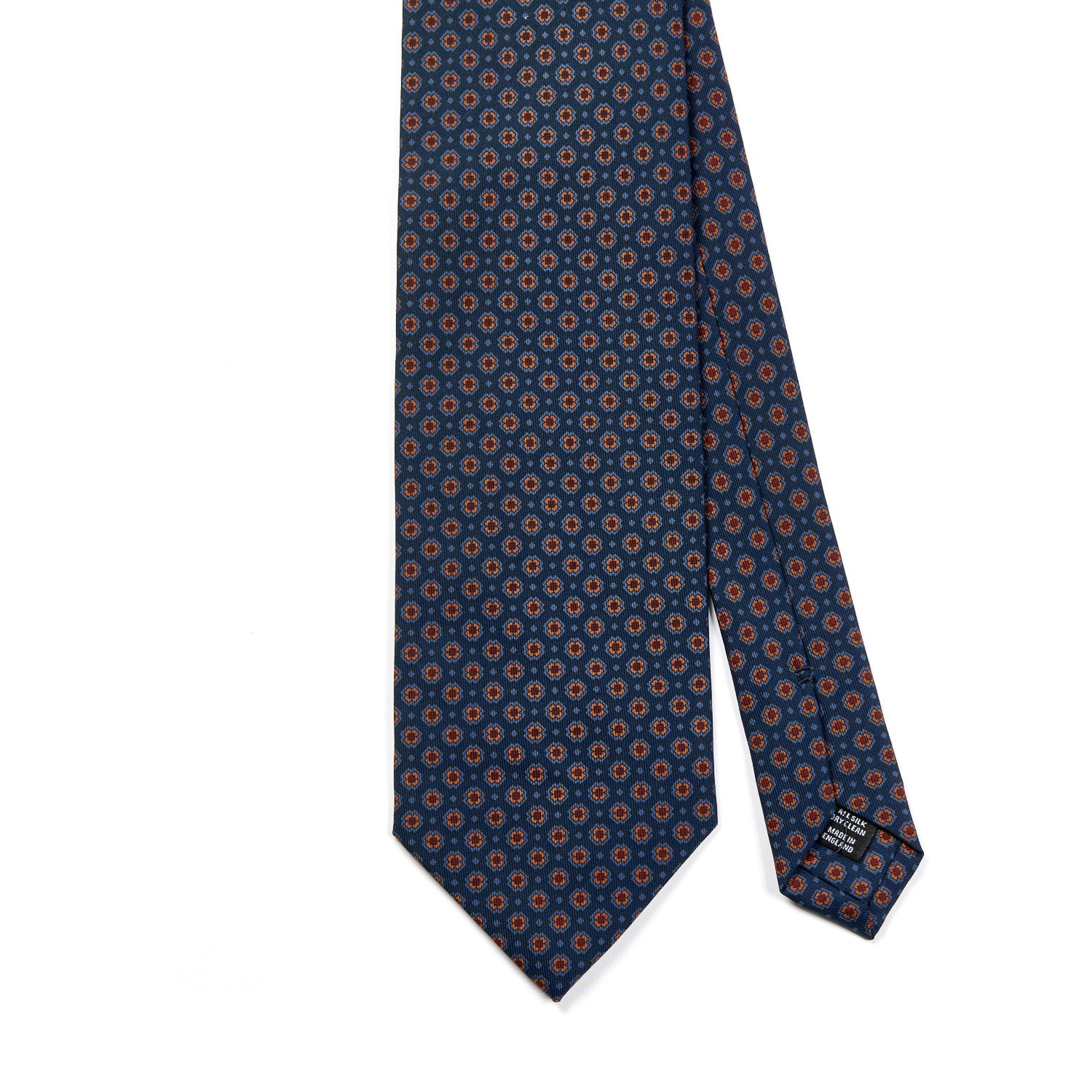 A Sovereign Grade Blue Small Floral Ancient Madder tie, handmade in the United Kingdom, by KirbyAllison.com.