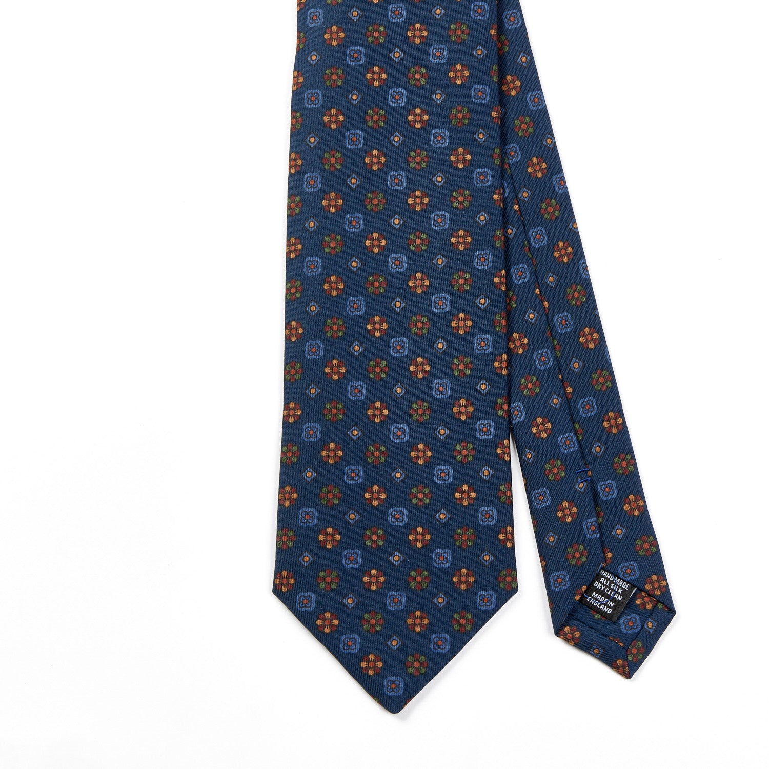 A Sovereign Grade Blue Mixed Floret Ancient Madder Tie with quality flowers on it from KirbyAllison.com.