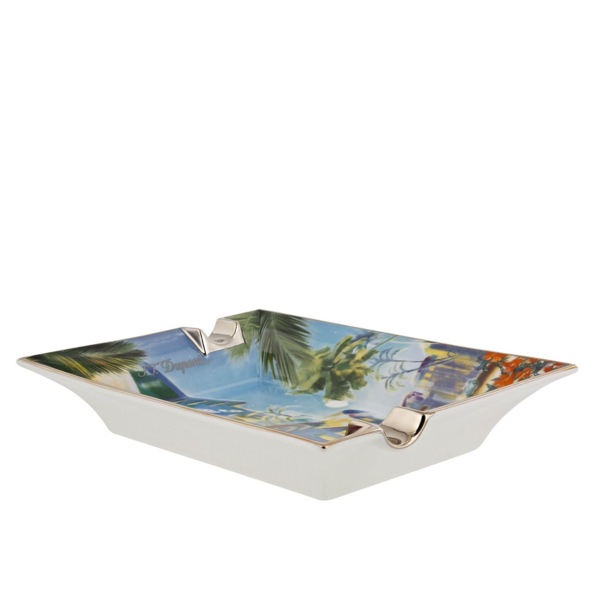 A rectangular porcelain ashtray from KirbyAllison.com, measuring H4cm x W22cm x D17cm approx., with a tropical island design and two cigar grooves for holding cigarettes.