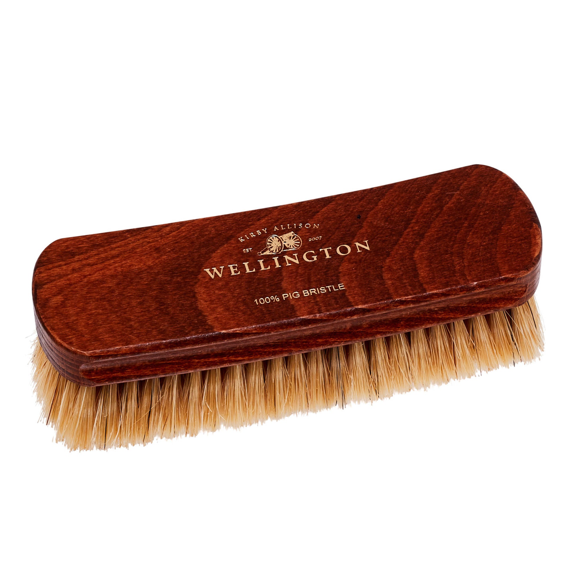 A Deluxe Wellington Pig Bristle Shoe Polishing Brush by KirbyAllison.com with a wooden handle.