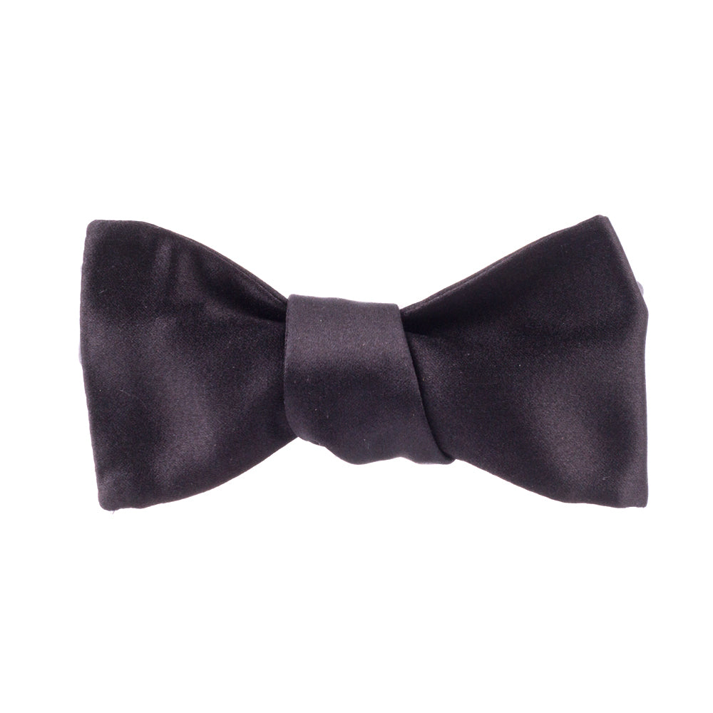 A Sovereign Grade Jumbo Satin Butterfly Bow Tie from KirbyAllison.com on a white background, perfect for formal black tie events.