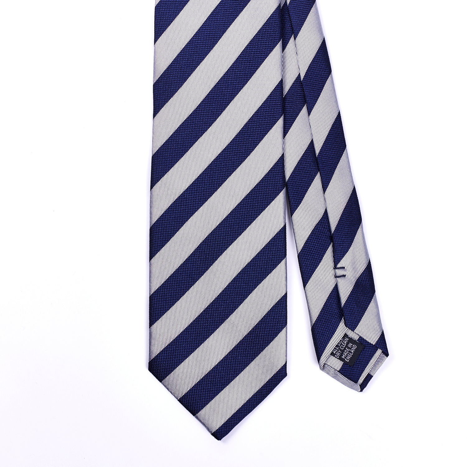 A Sovereign Grade Woven Navy and Silver Rep Tie, 150 cm from KirbyAllison.com on a white background.