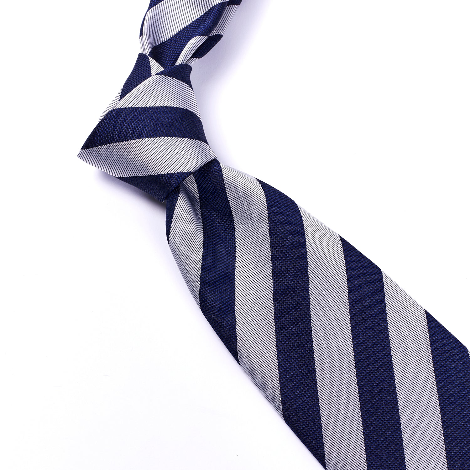 A Sovereign Grade Woven Navy and Silver Rep Tie, 150 cm on a white background from KirbyAllison.com ties.