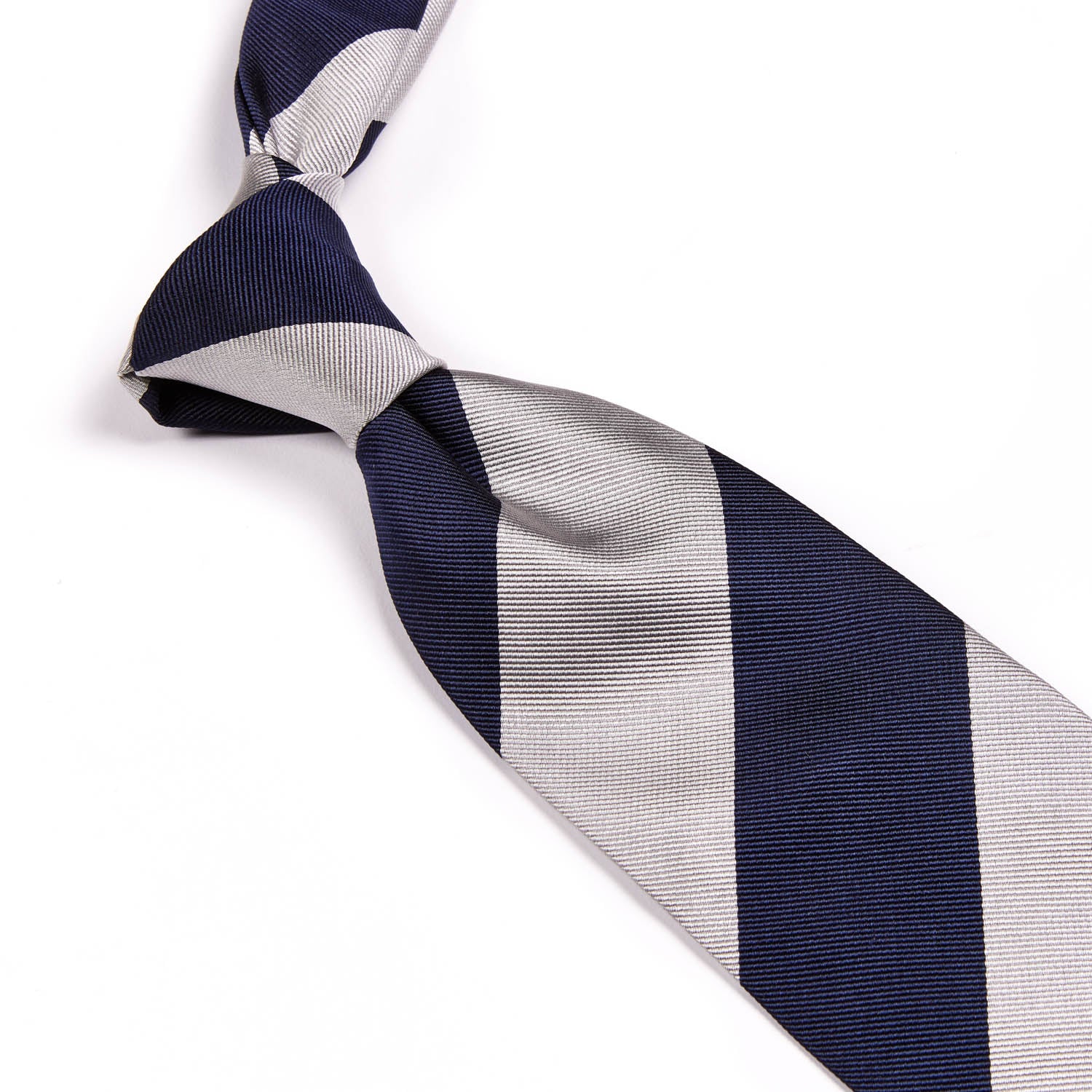 A Sovereign Grade Navy Wide Rep Tie, 150 cm inspired by United Kingdom, on a white background and handcrafted by KirbyAllison.com.