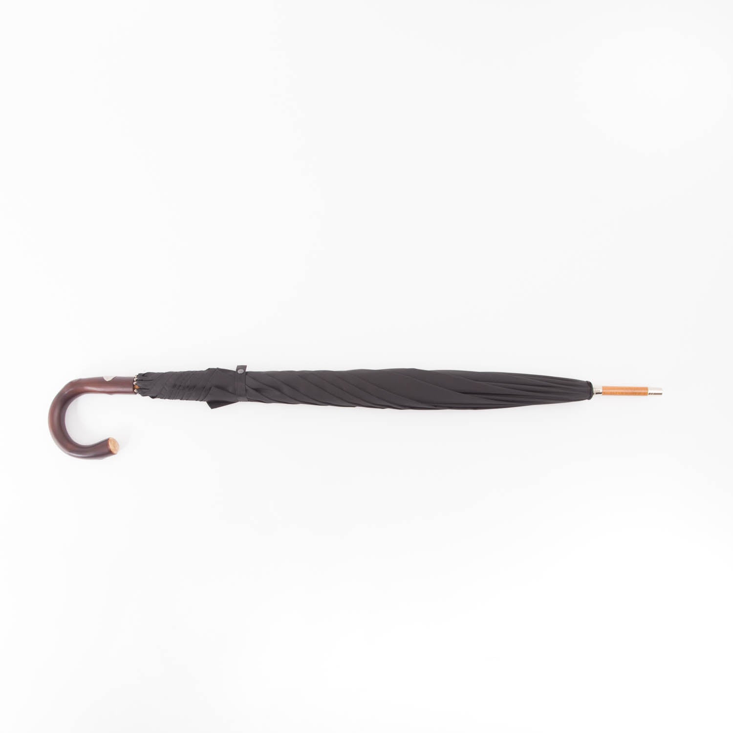 A black Doorman Umbrella with Chestnut Handle providing rain protection, displayed on a white background from KirbyAllison.com.