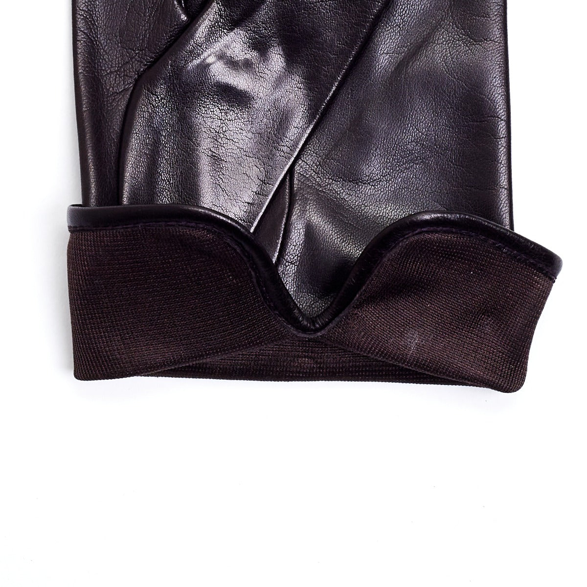 A pair of Sovereign Grade Dark Brown Nappa Leather Gloves, Silk Lined from KirbyAllison.com on a white surface.