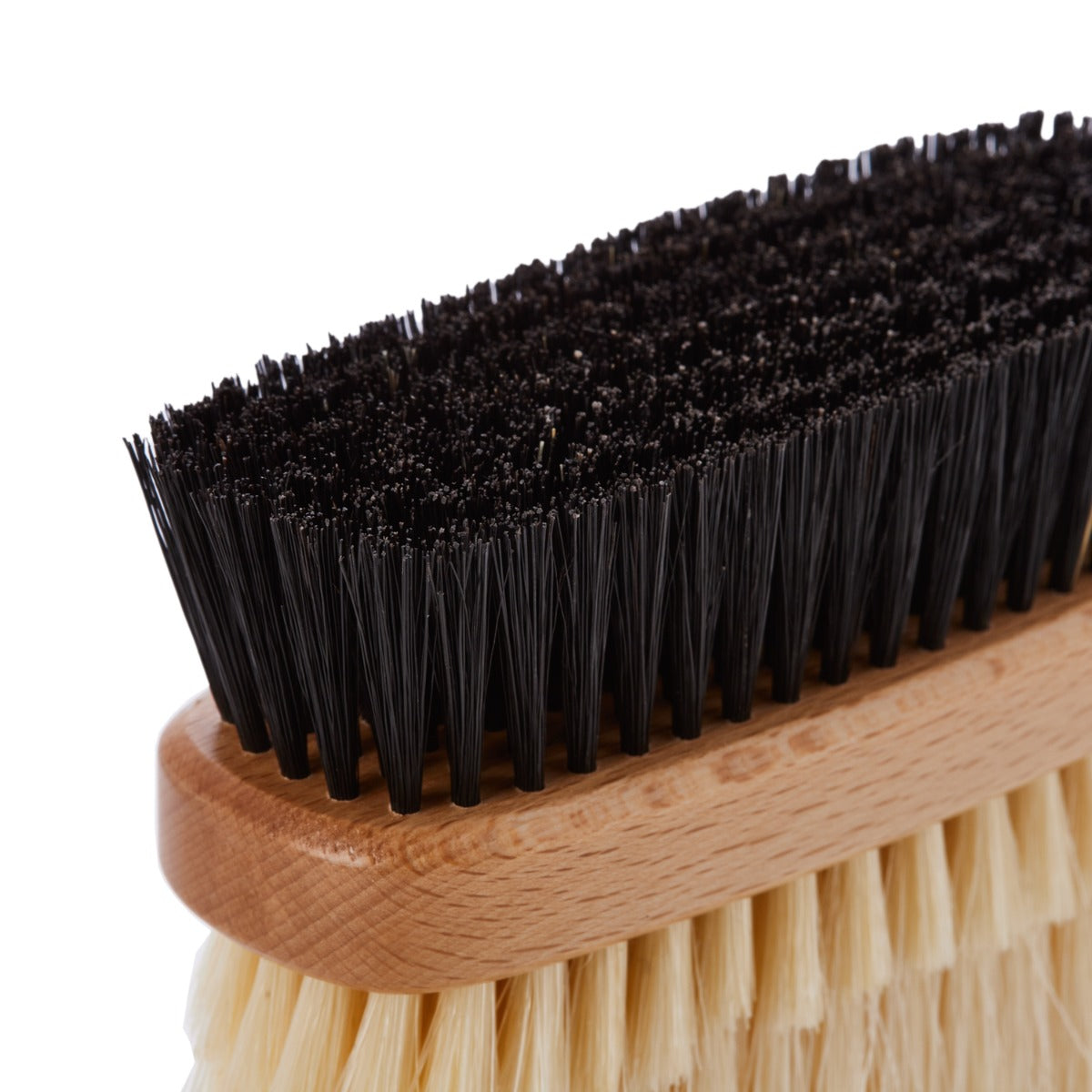 A KirbyAllison.com Deluxe Double-Sided Garment Brush with black bristles on a white background.
