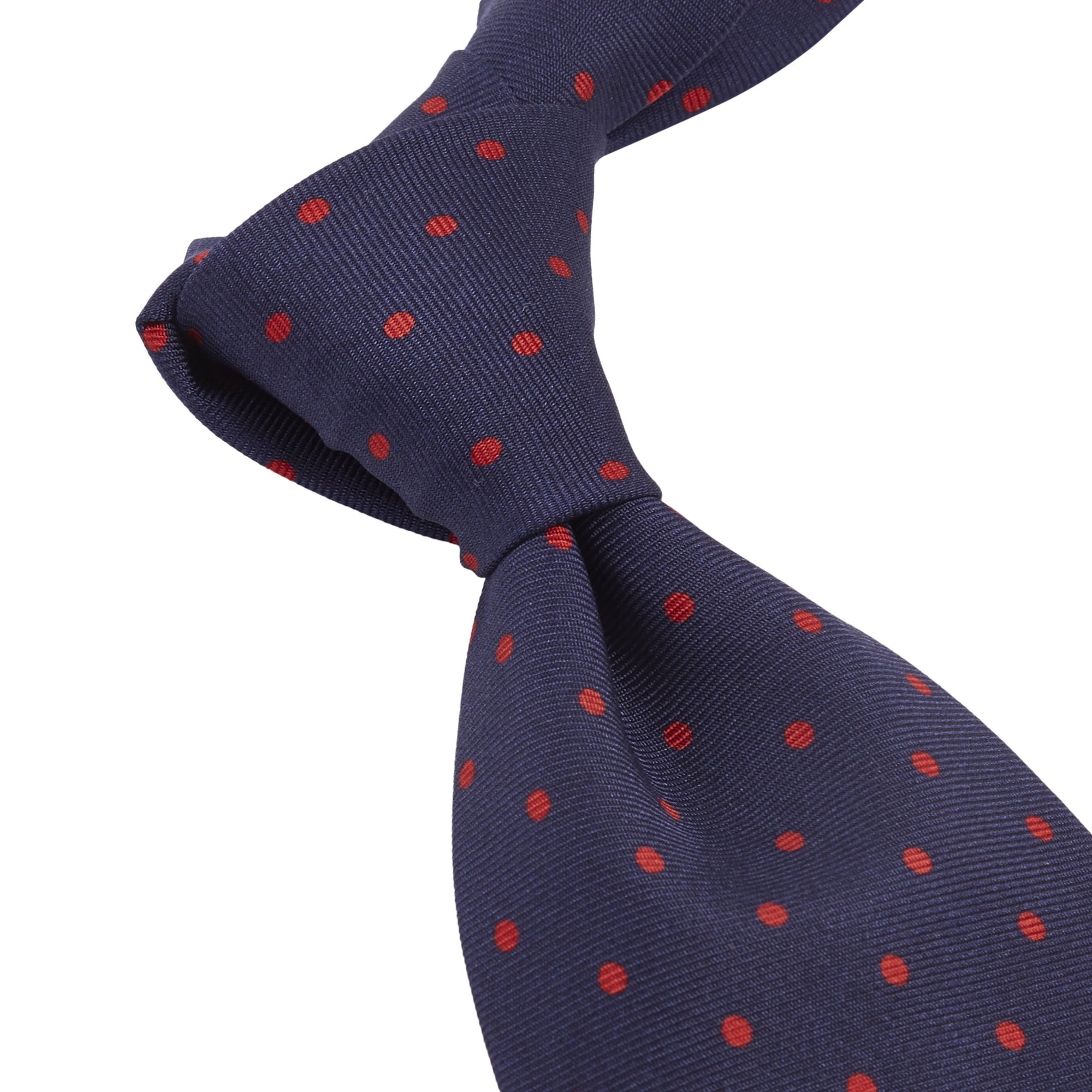 A Sovereign Grade Navy-Red London Dot Printed Silk Tie with red and blue polka dots from KirbyAllison.com.