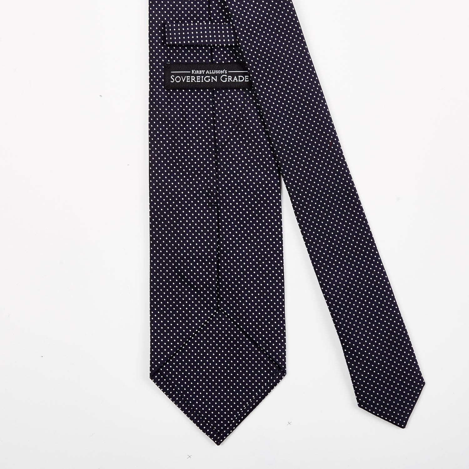 A Sovereign Grade Navy Silk Micro Dot Tie from KirbyAllison.com with handmade quality.