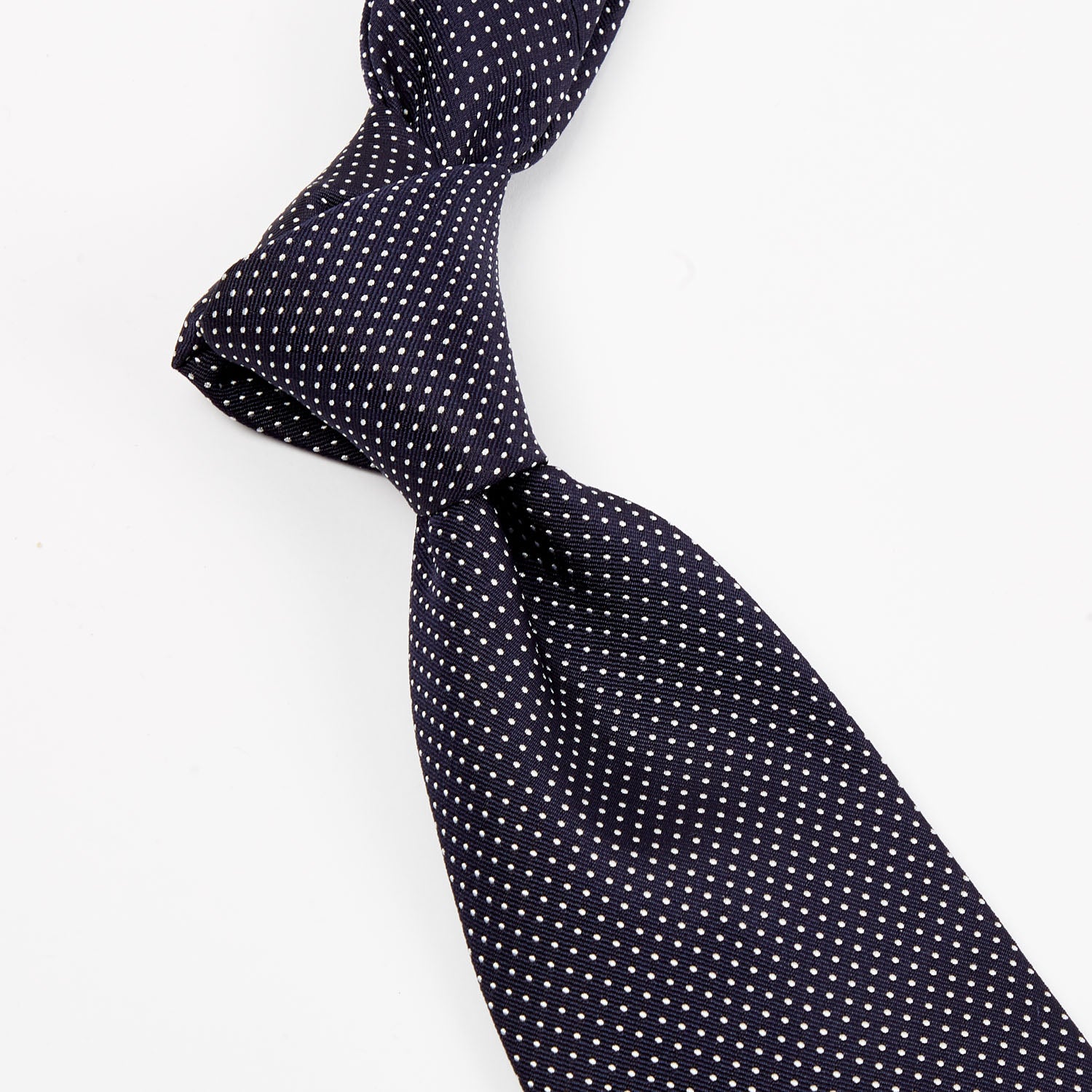 A Sovereign Grade Navy Silk Micro Dot Tie from KirbyAllison.com of quality.