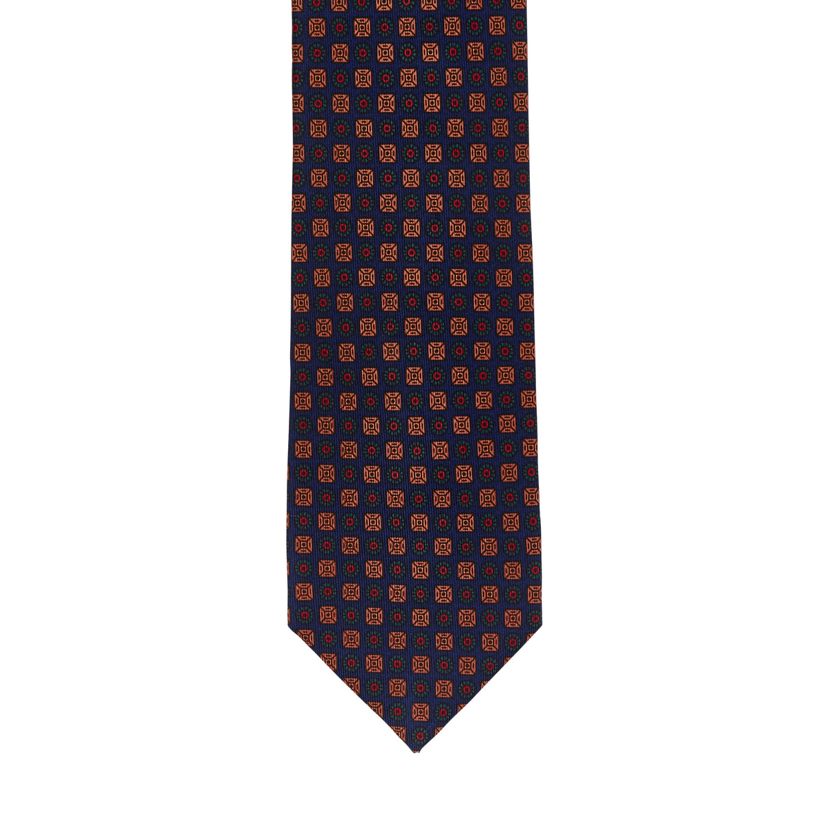 A Sovereign Grade Dark Navy Ancient Madder Tie with polka dots on a white background, made to the highest quality standards in the United Kingdom by KirbyAllison.com.