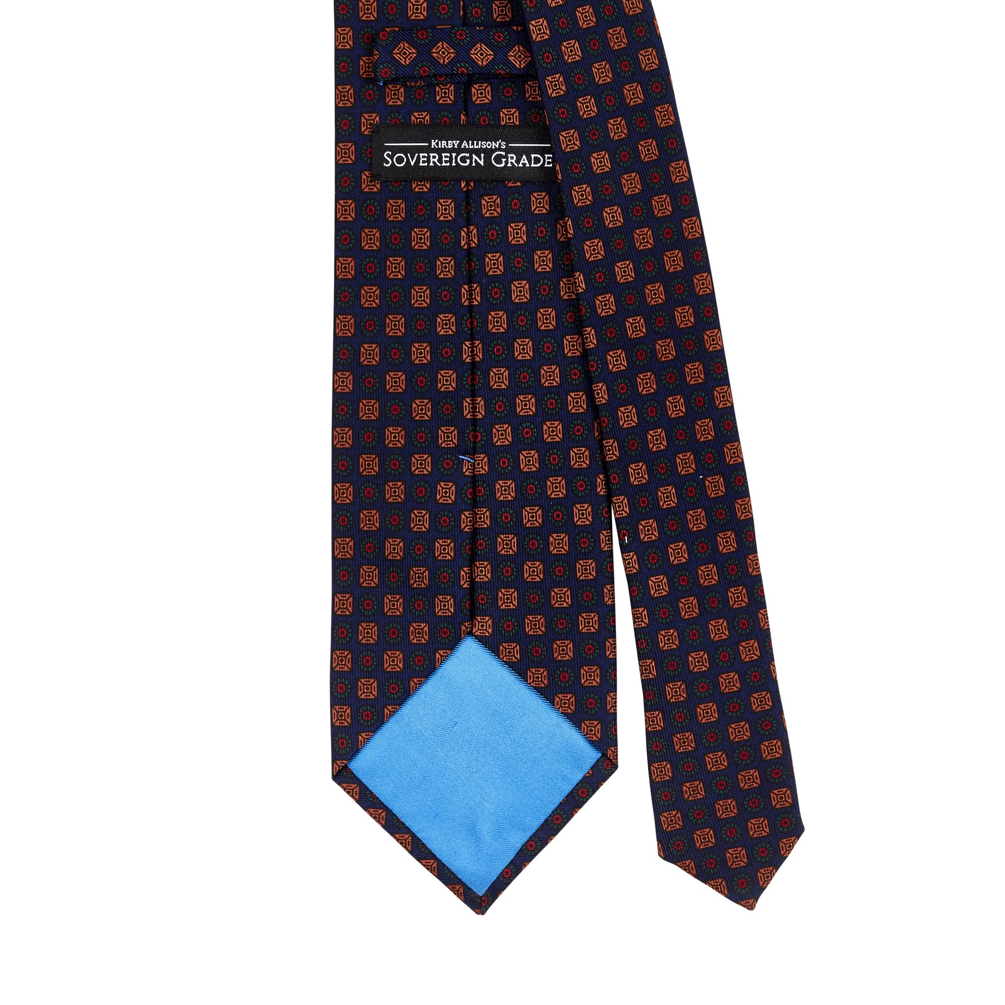 A highest quality Sovereign Grade Dark Navy Ancient Madder necktie by KirbyAllison.com with a blue and orange polka dot pattern.