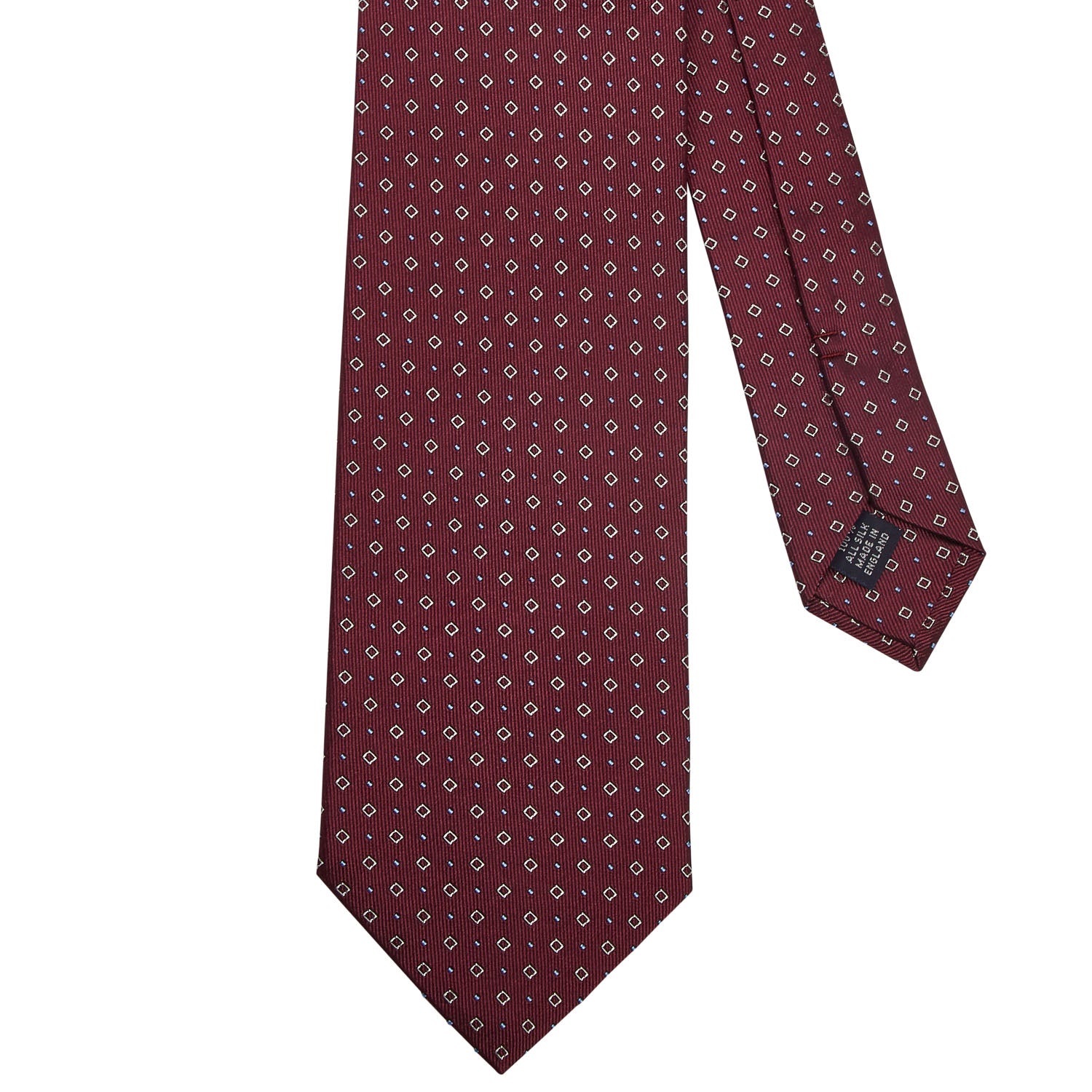 A Sovereign Grade Oxblood Alternating Square Dot Jacquard Tie, crafted by KirbyAllison.com in the United Kingdom.