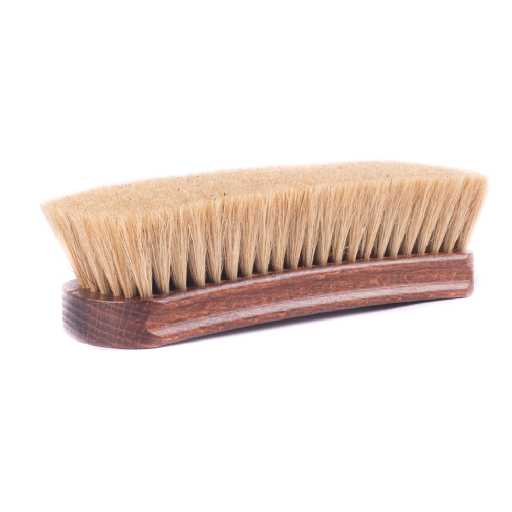 A Deluxe Wellington Pig Bristle Shoe Polishing Brush with a wooden handle from KirbyAllison.com.