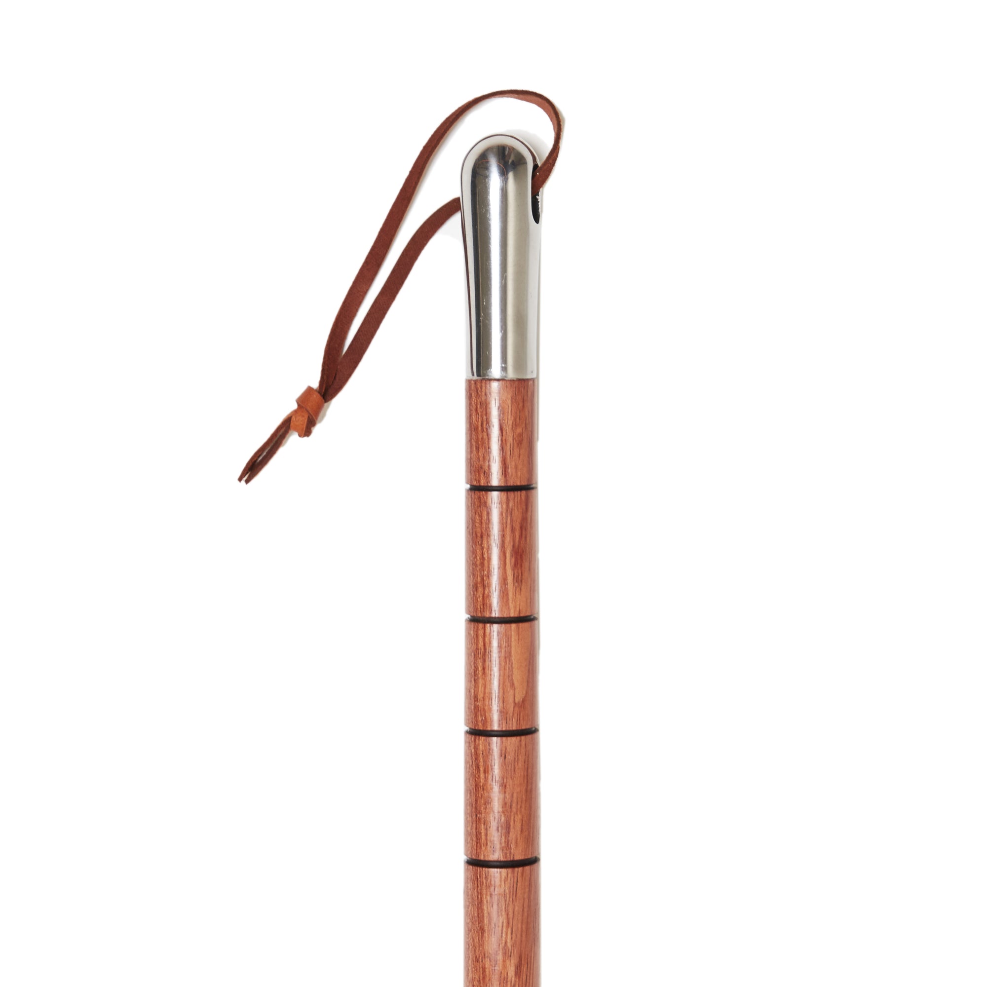 A KirbyAllison.com Hanger Project Bubinga Full-Length Shoe Horn with a metal handle.