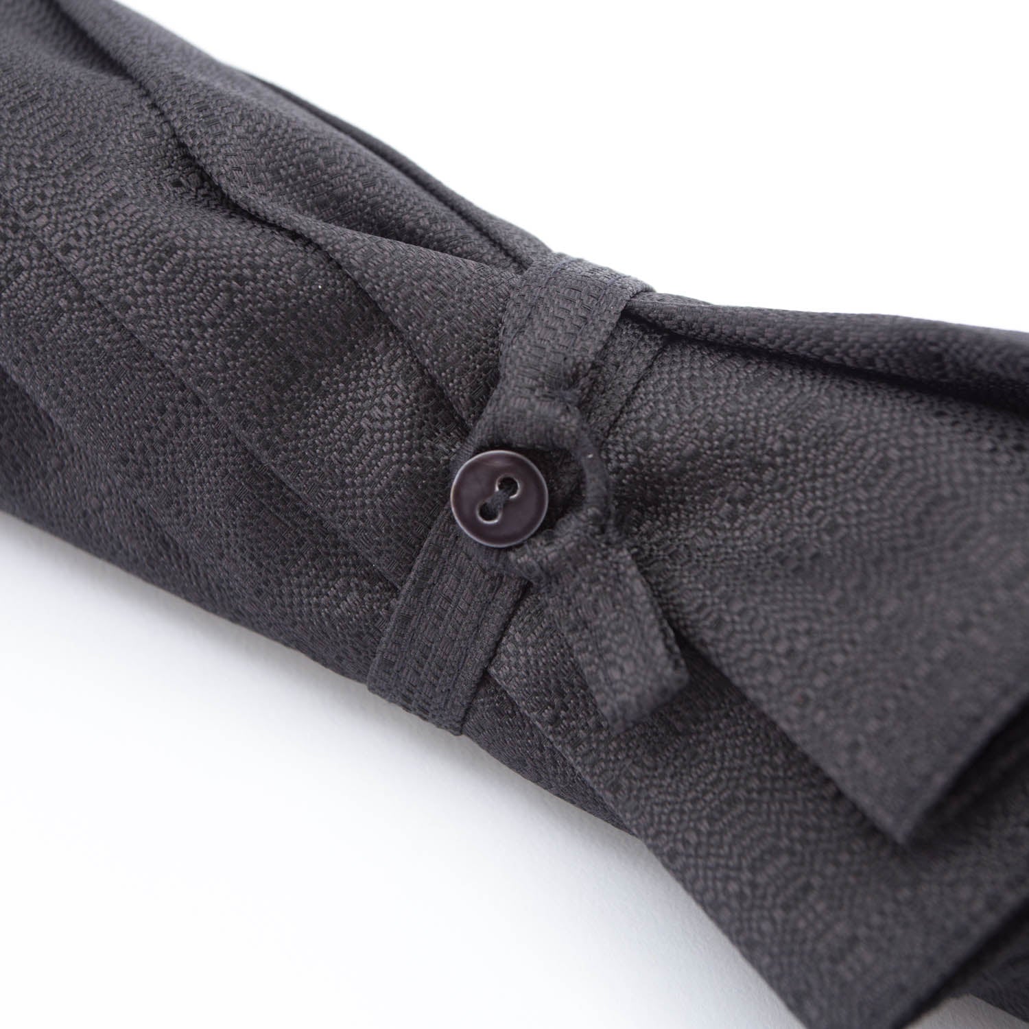 A Imperial Black Travel Umbrella with Woven Leather Handle from KirbyAllison.com.