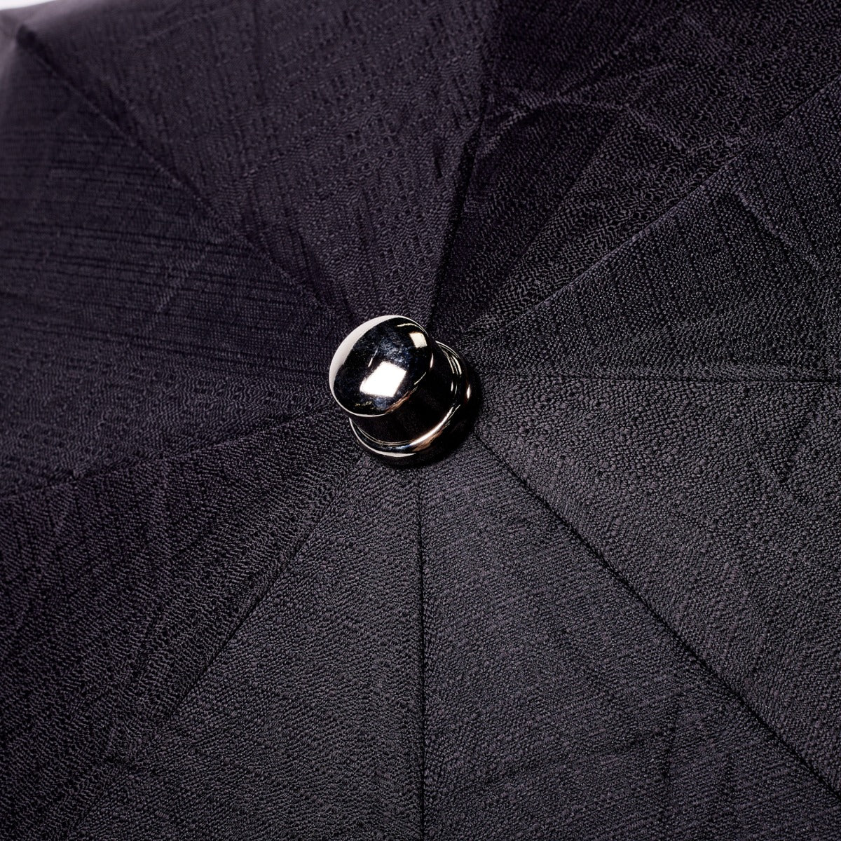 A Brown Pigskin Travel Umbrella with Black Canopy made by KirbyAllison.com.