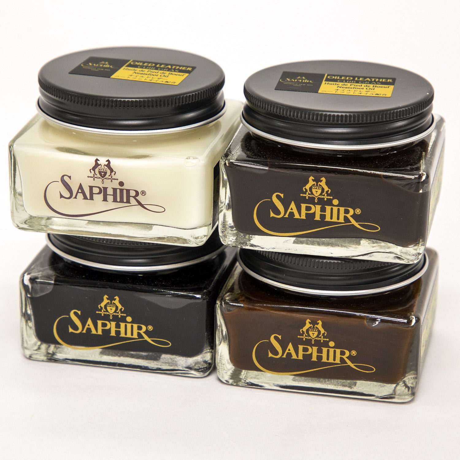 Four jars of Saphir Medaille d'Or Oiled Leather Cream for Chromexcel made by KirbyAllison.com in France.