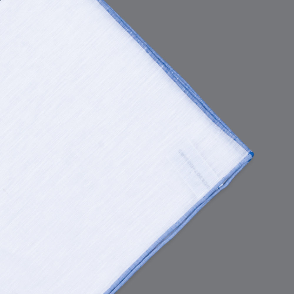 A KirbyAllison.com Simonnot Godard Benjamin Linen Pocket Square in white and blue on a gray background.