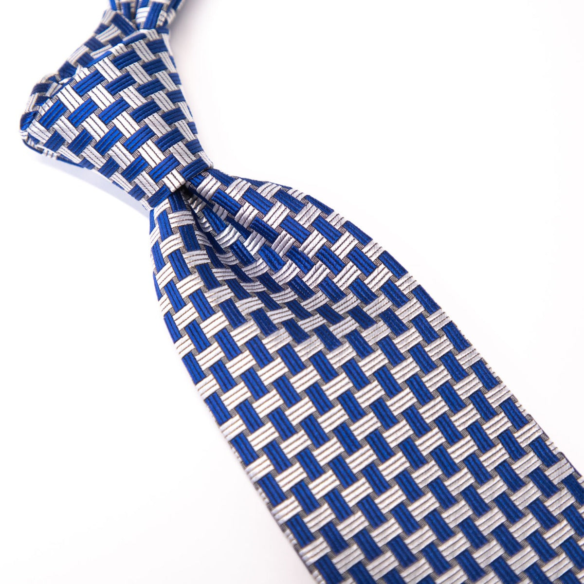 A Sovereign Grade Blue Basket Weave Silk Tie from KirbyAllison.com on a white surface.
