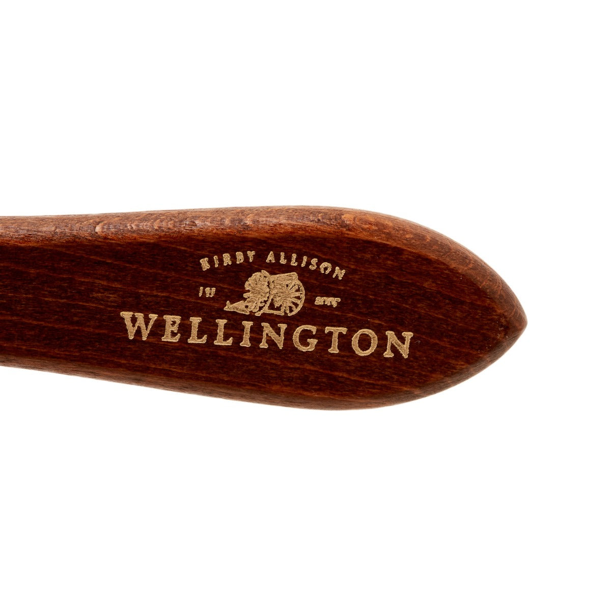A Wellington Deluxe Shoe Polish Dauber with the word KirbyAllison.com on it, used for shoe polish applications.