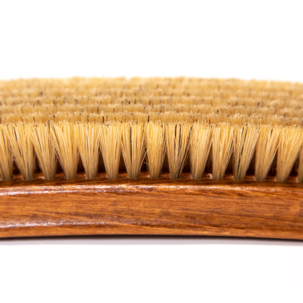 A Wellington Deluxe Pig Bristle Suede Cleaning Brush with brown bristles from KirbyAllison.com.