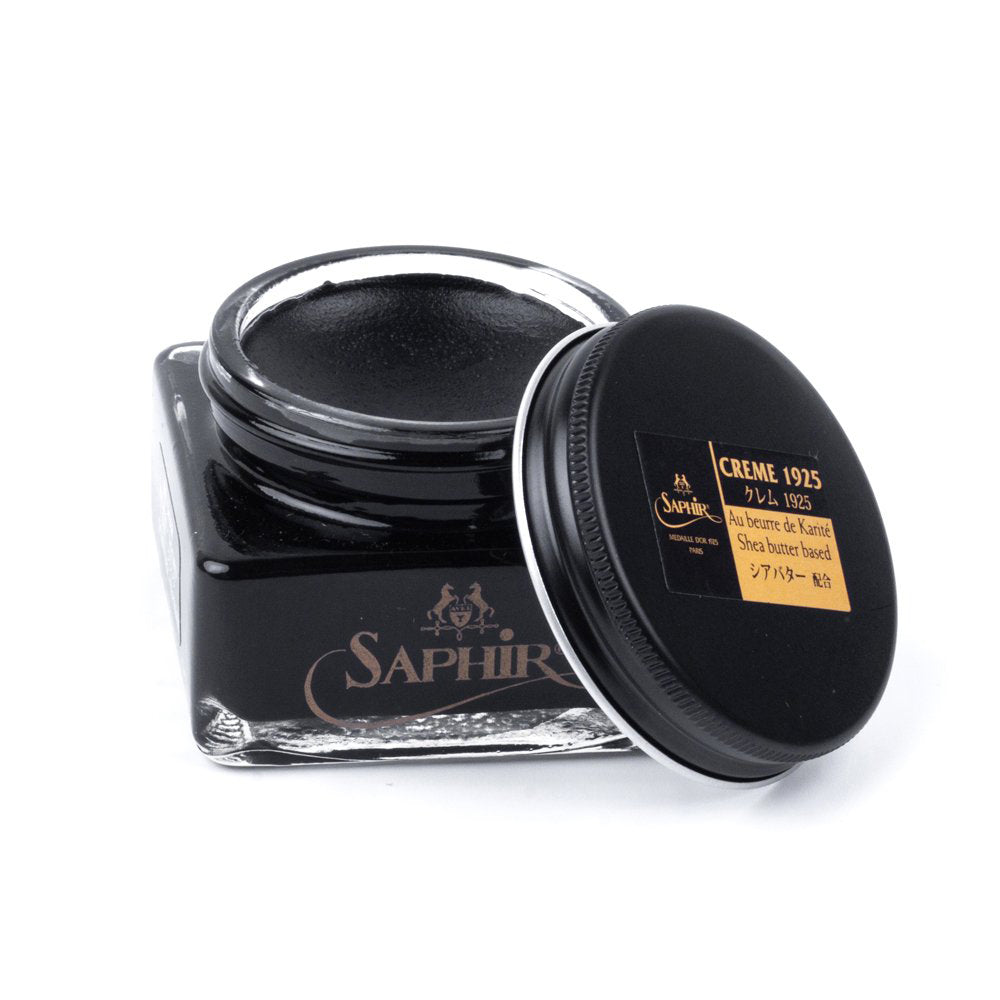 A jar of black ink with a gold lid for Saphir Pommadier Cream Shoe Polish by KirbyAllison.com.