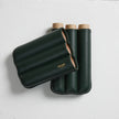 A Bosque Smooth Forest Green Cylindrical Leather Cigar Case with French leathers.