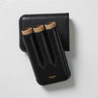 A black leather Bosque cigar case.
