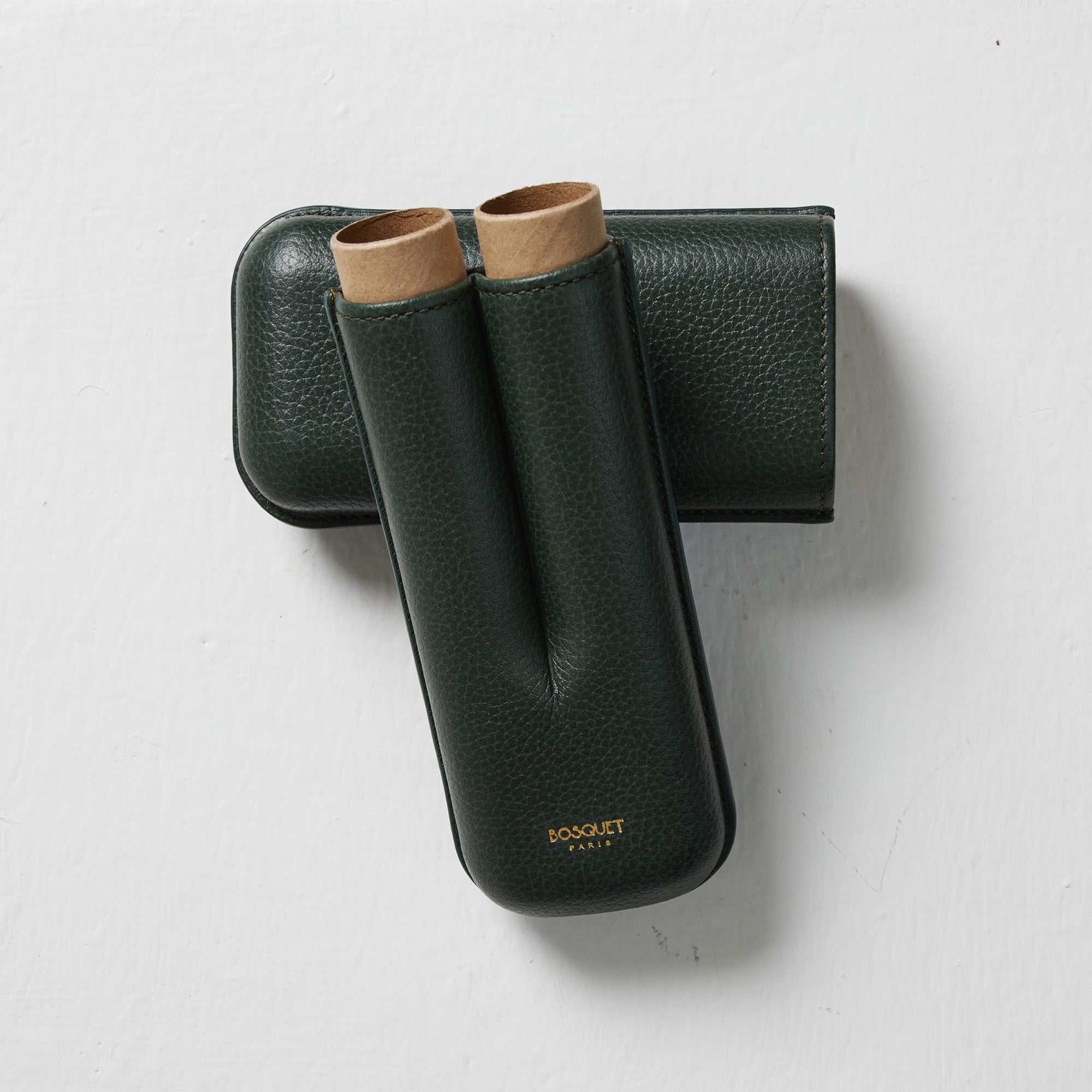 A Bosquet Smooth Forest Green Leather Cigar Case for transporting cigars. (Brand: Bosque)