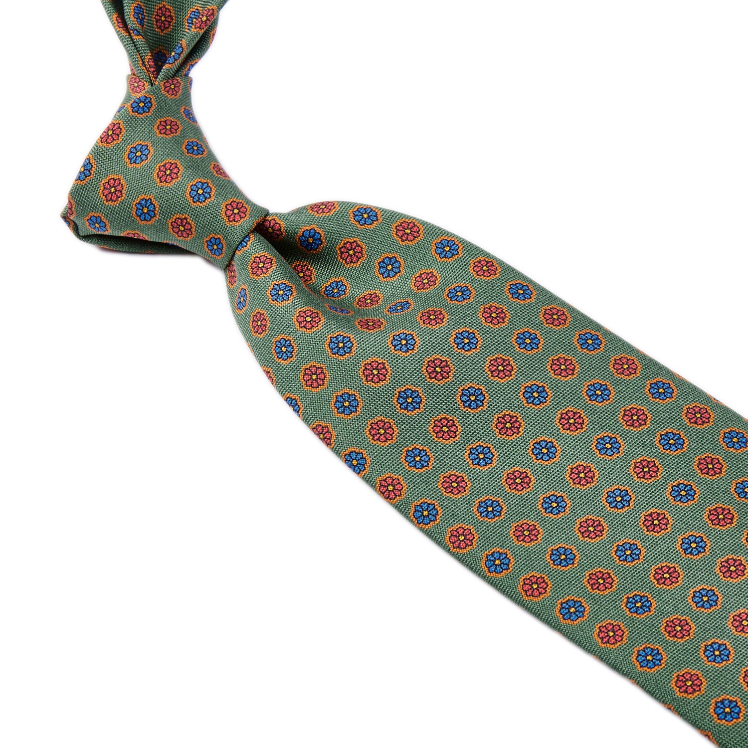 A Sovereign Grade Leaf Floral 25 oz Hopsack Silk Tie with red and blue circles on it, crafted with the highest quality craftsmanship in the United Kingdom, from KirbyAllison.com.