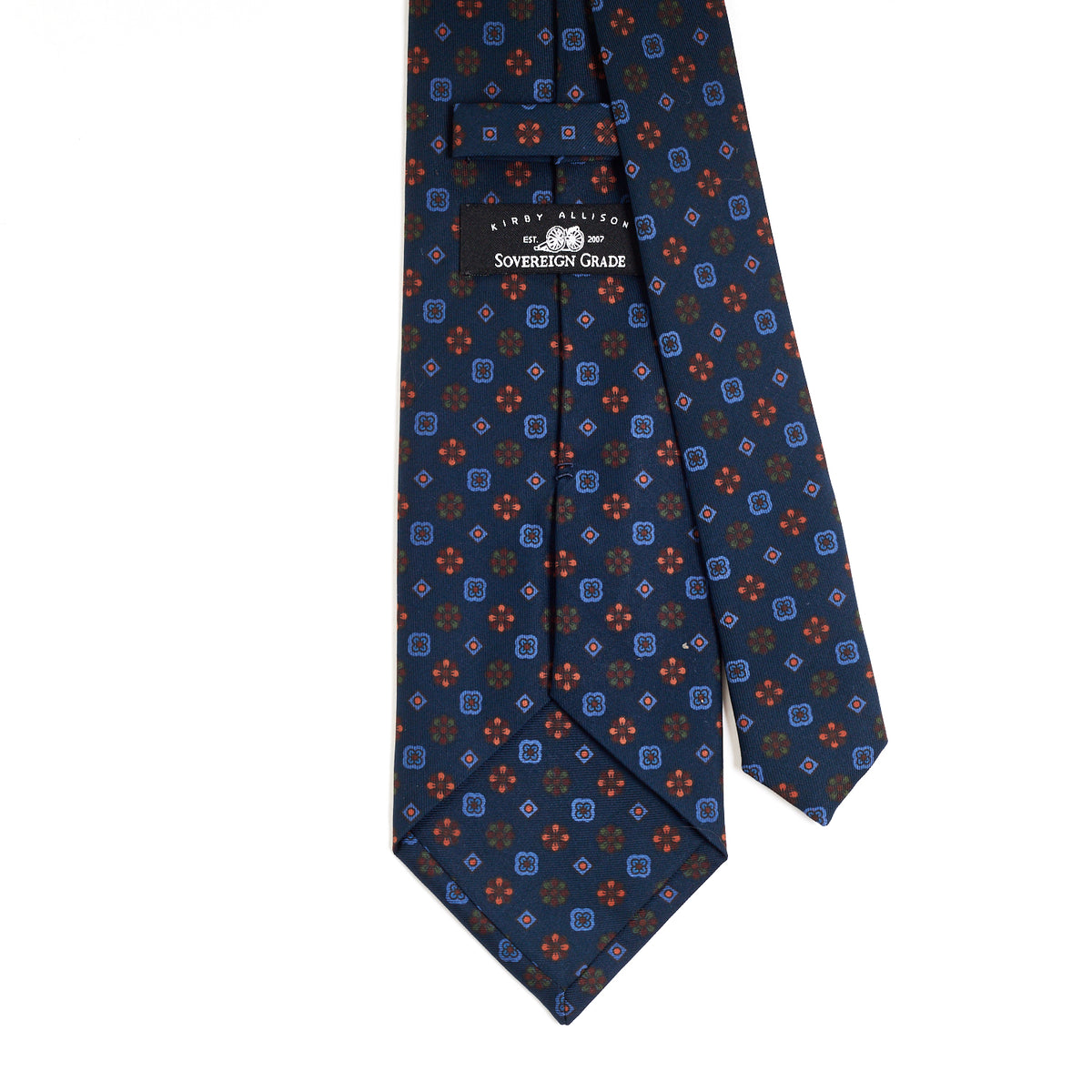 A Sovereign Grade Dark Navy Mixed Floret Ancient Madder Tie from KirbyAllison.com, with a blue and orange pattern of highest quality.