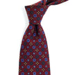 A Sovereign Grade Rust Mixed Floret Ancient Madder tie with exquisite craftsmanship from KirbyAllison.com.