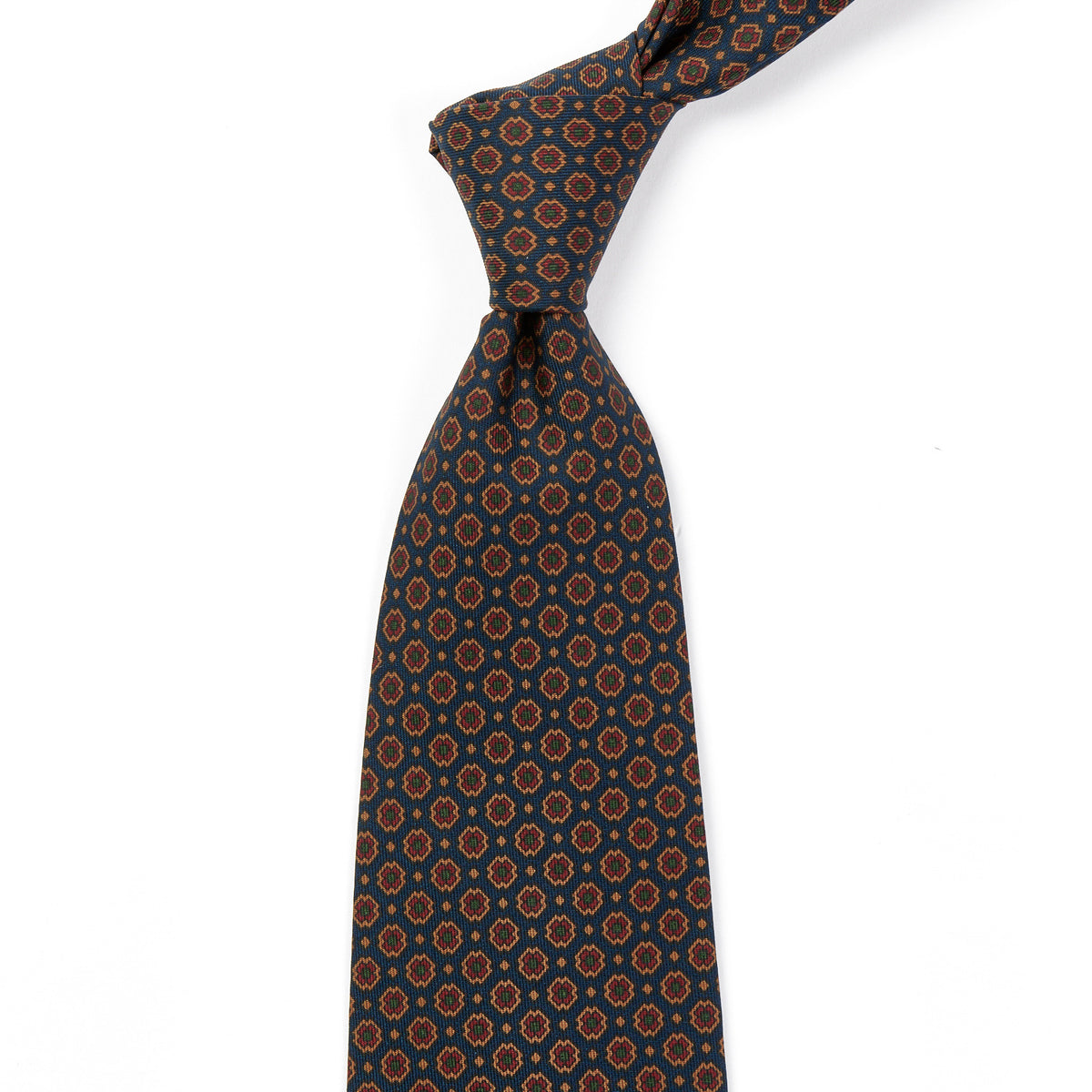 A high-quality Sovereign Grade Dark Navy Small Floral Ancient Madder Tie, handmade in the United Kingdom and available on KirbyAllison.com.