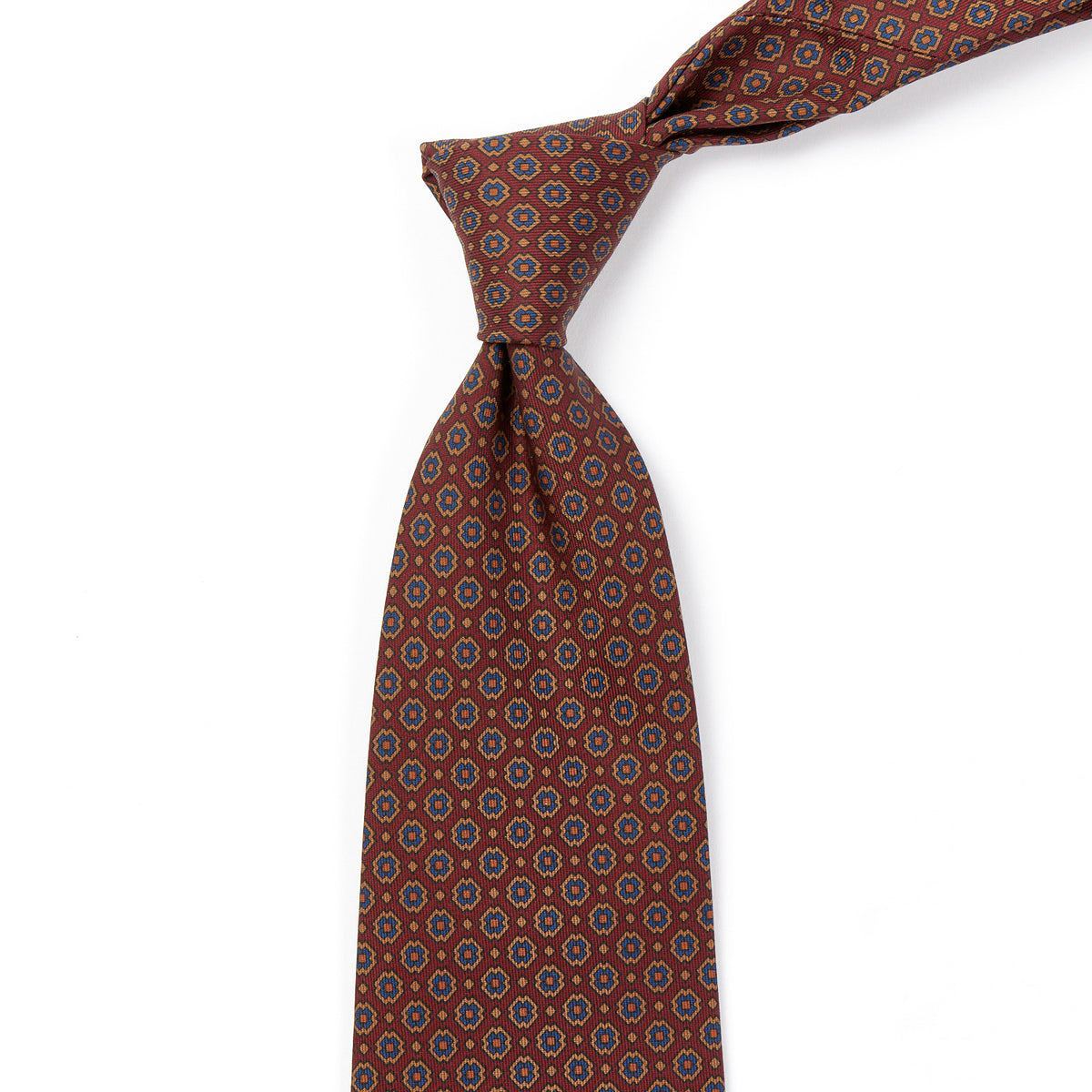 A Sovereign Grade Rust Small Floral Ancient Madder Tie by KirbyAllison.com, handmade in the United Kingdom.
