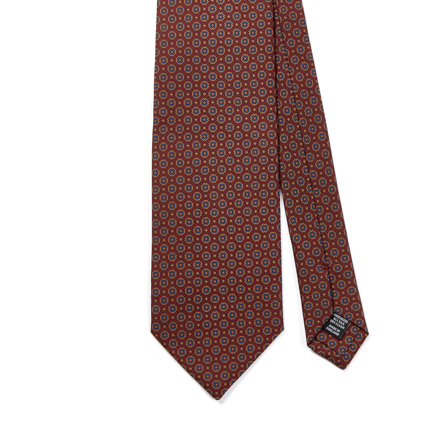 A handmade Sovereign Grade Rust Small Floral Ancient Madder Tie with a geometric pattern of the highest quality craftsmanship from KirbyAllison.com.
