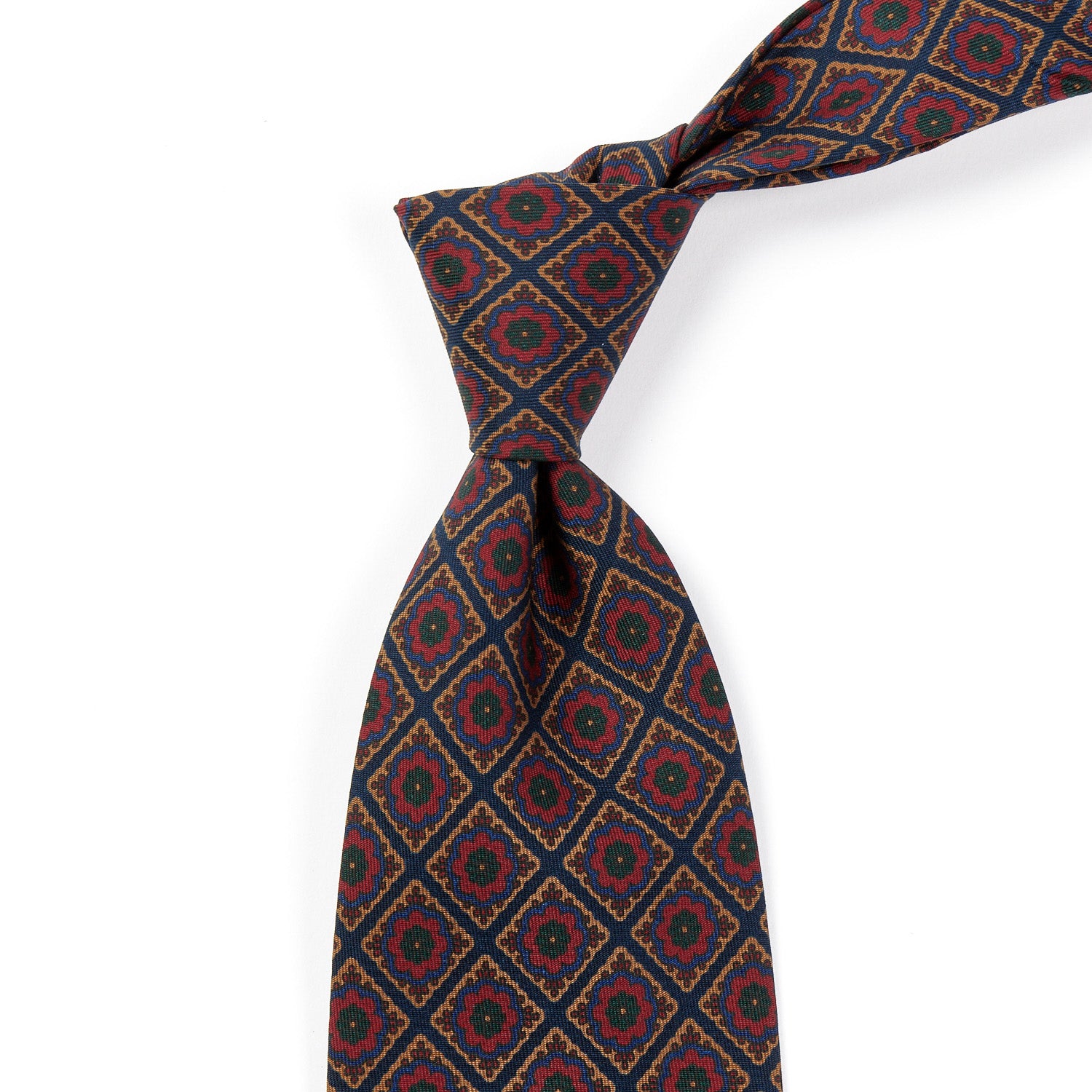 A Sovereign Grade Dark Navy/Red Oversized Medallion Ancient Madder Tie, crafted from 100% English silk by KirbyAllison.com.