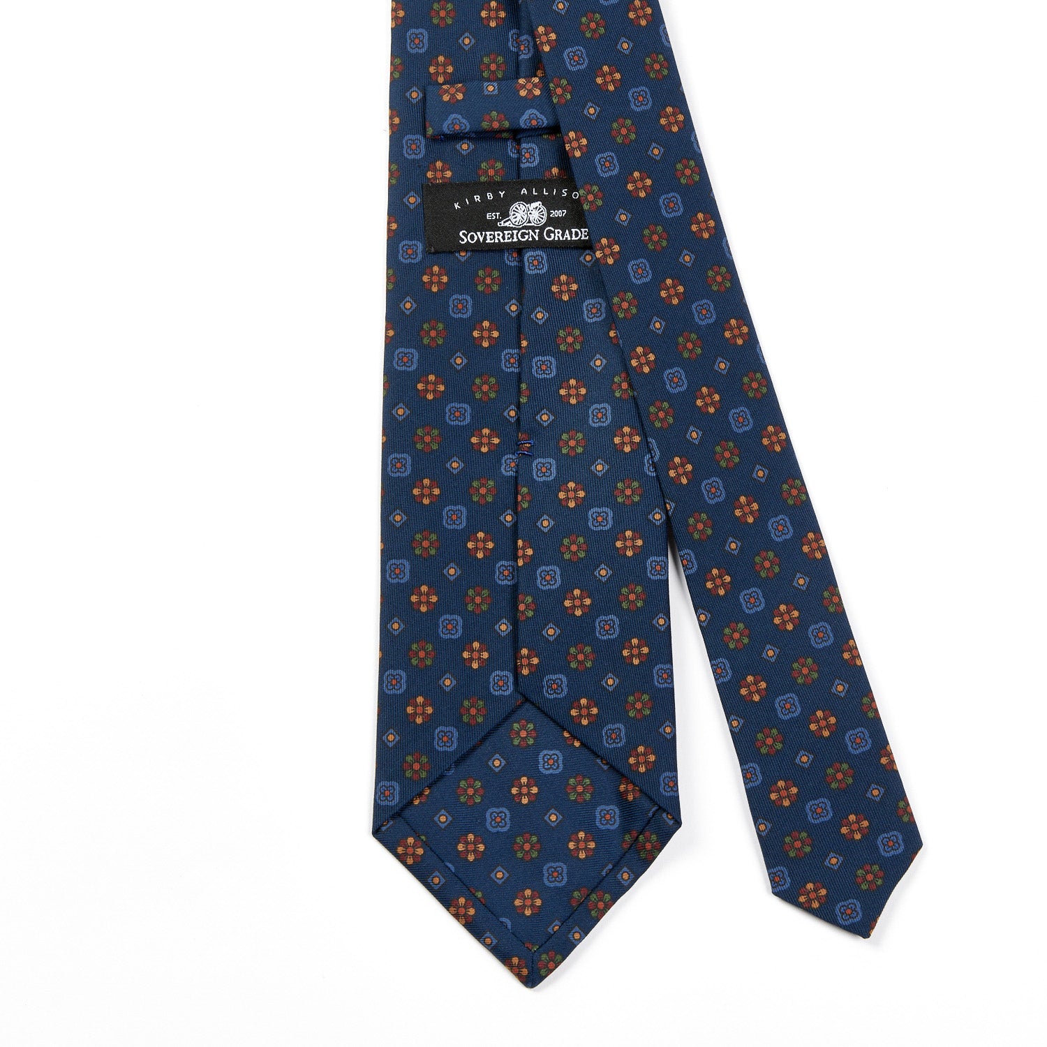 A Sovereign Grade Blue Mixed Floret Ancient Madder Tie from KirbyAllison.com with quality orange and blue flowers on it.