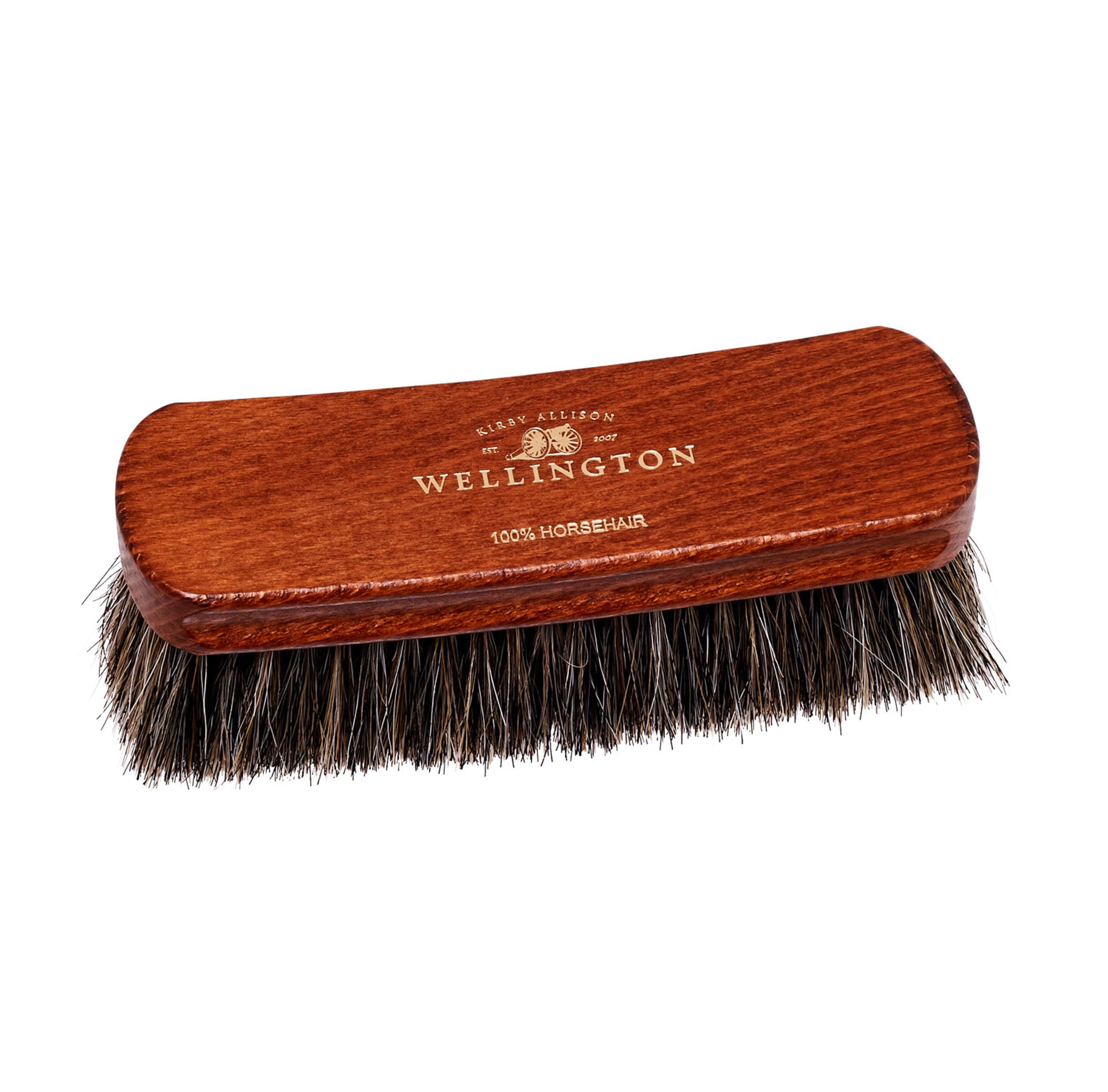 A Deluxe Wellington Horsehair Buffing Brush with the words KirbyAllison.com engraved on the wooden handle.