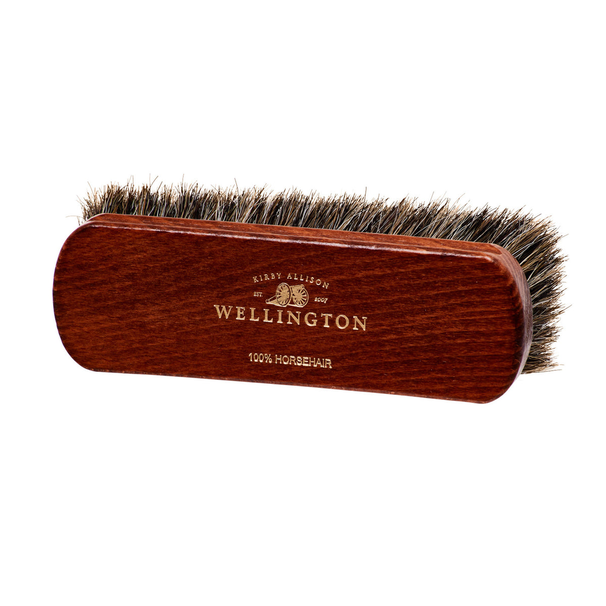 A Deluxe Wellington Horsehair Buffing Brush from KirbyAllison.com with the words wellington on it.