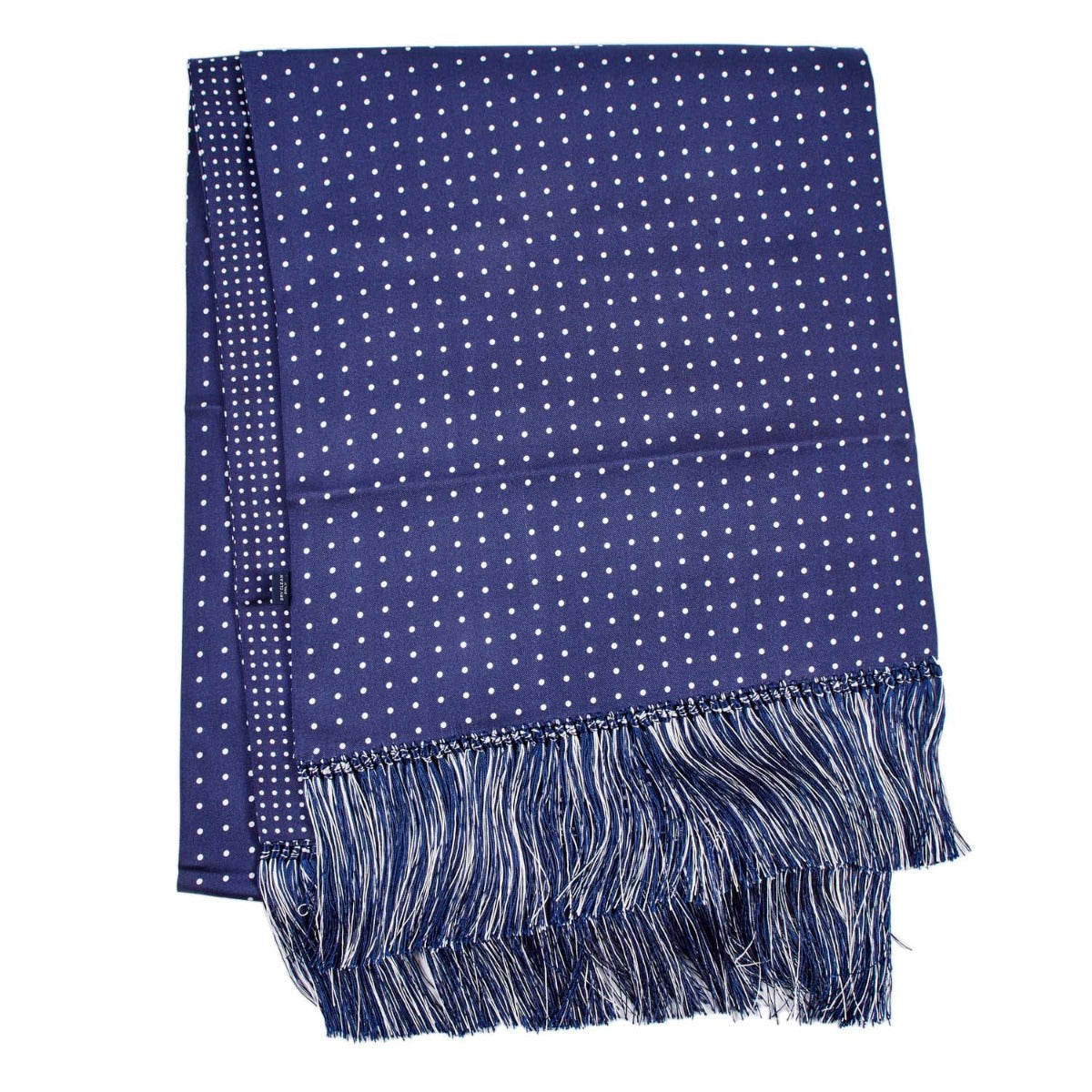 A Sovereign Grade Navy London Dot 36oz Reversible Printed Silk Scarf by KirbyAllison.com, with fringes, perfect for winter in England.