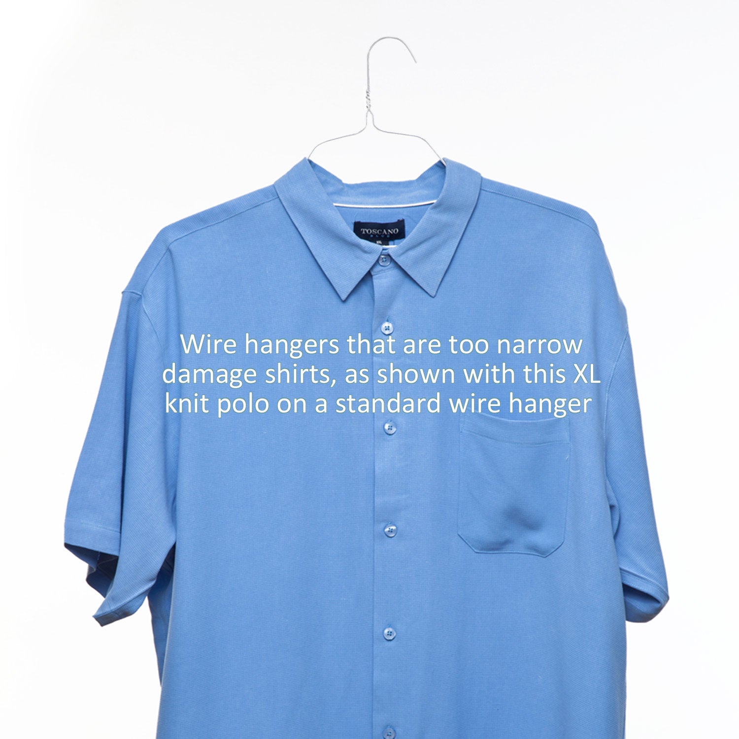 A blue shirt hanging on a Luxury Wooden Shirt Hanger (Set of 5) from KirbyAllison.com that is too narrow.