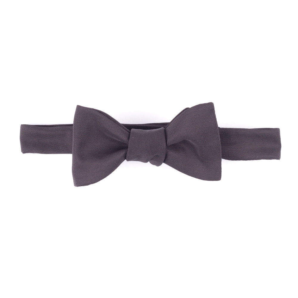 A Sovereign Grade Black Barathea Bow Tie from KirbyAllison.com, handmade in gray silk on a white background, perfect for formal occasions.