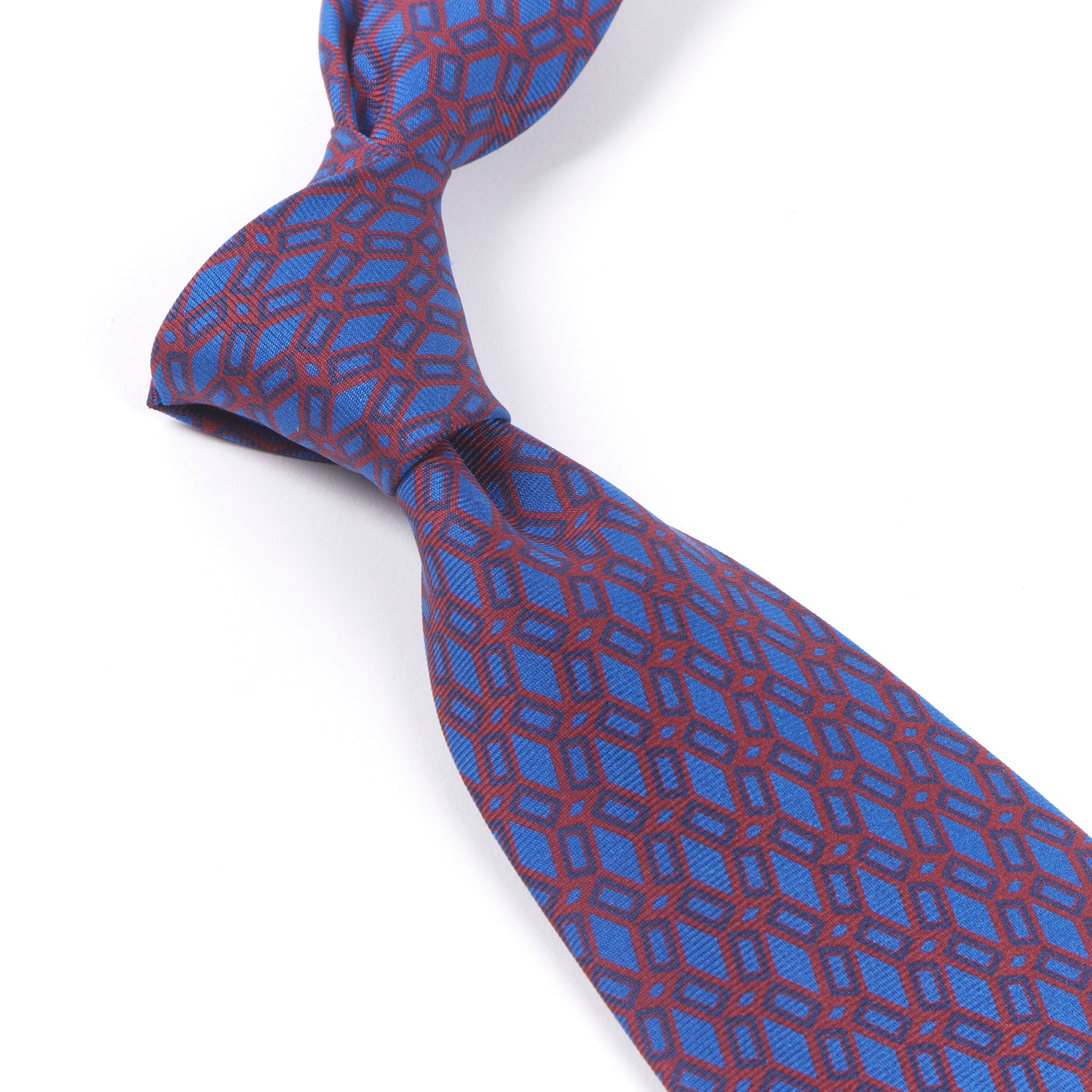Handmade British Sovereign Grade Rust Ancient Madder Tie, 150cm with a geometric pattern in blue and red by KirbyAllison.com.