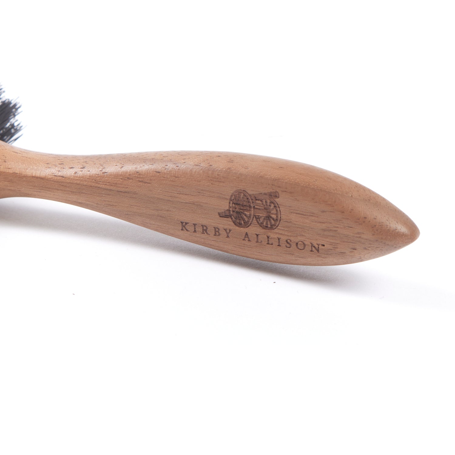 A Kirby Allison Double-Sided Hat Brush made with natural bristles.