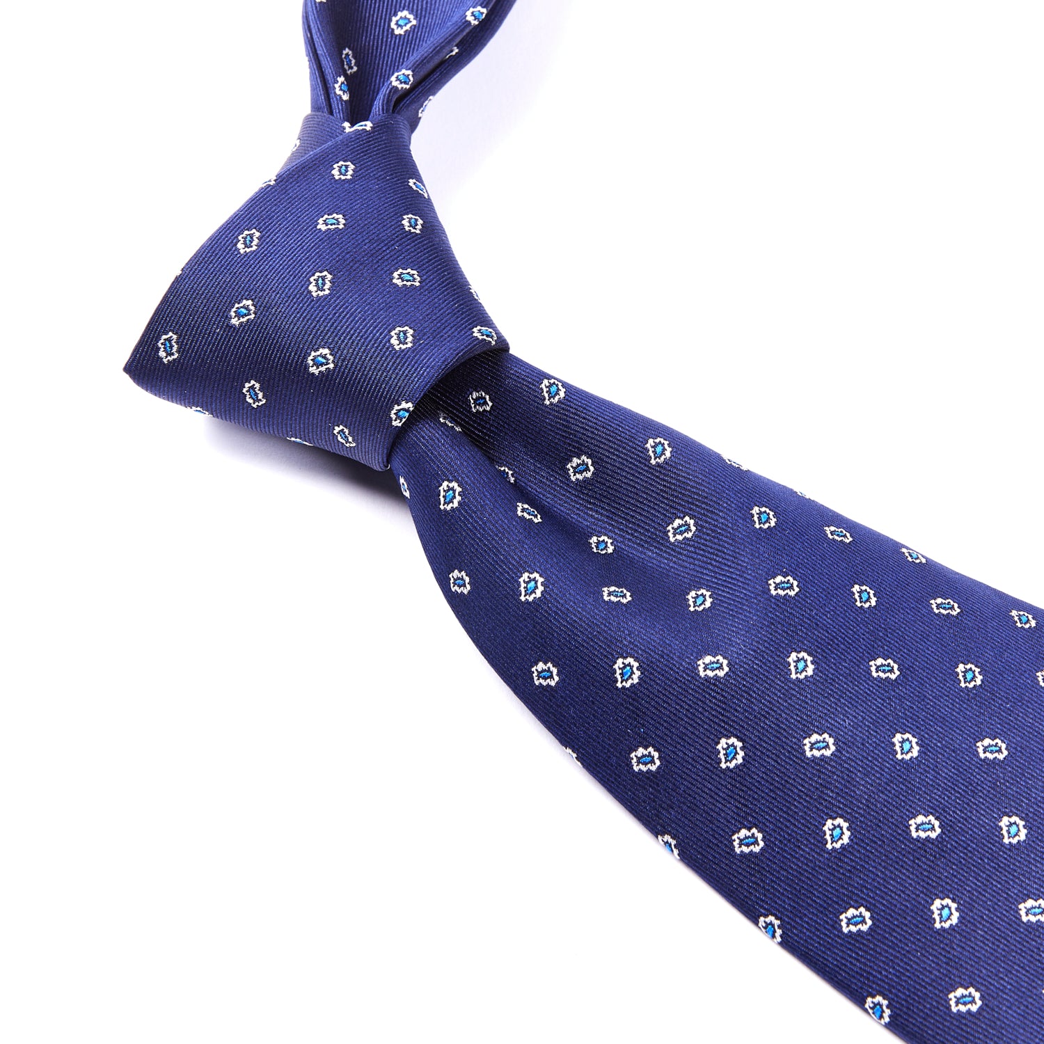 A KirbyAllison.com Sovereign Grade Navy Micro Paisley Jacquard Tie, 150 cm, made of 100% English silk.