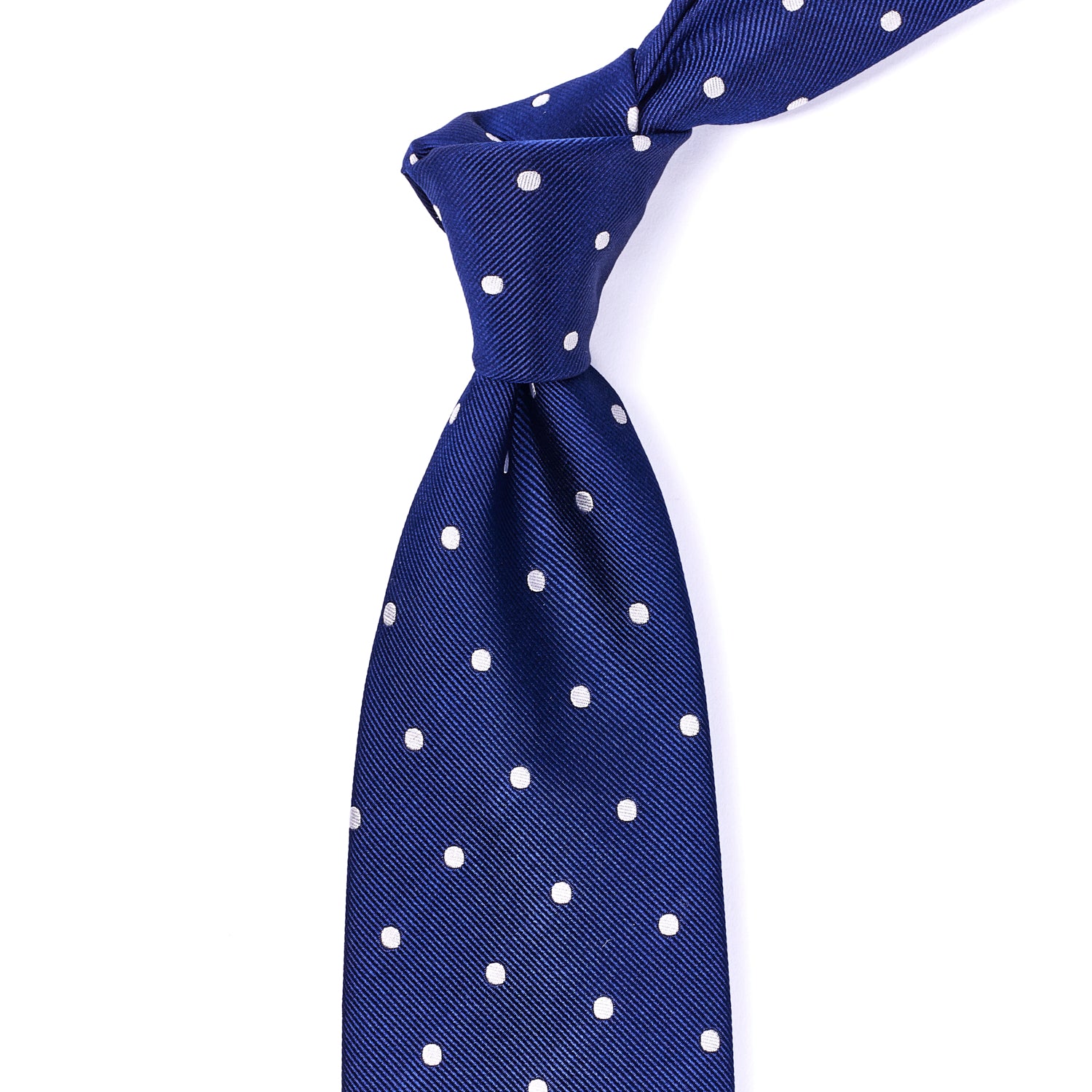 A Sovereign Grade Woven Navy/White Wide Dot Tie, 150 cm by KirbyAllison.com on a white background.