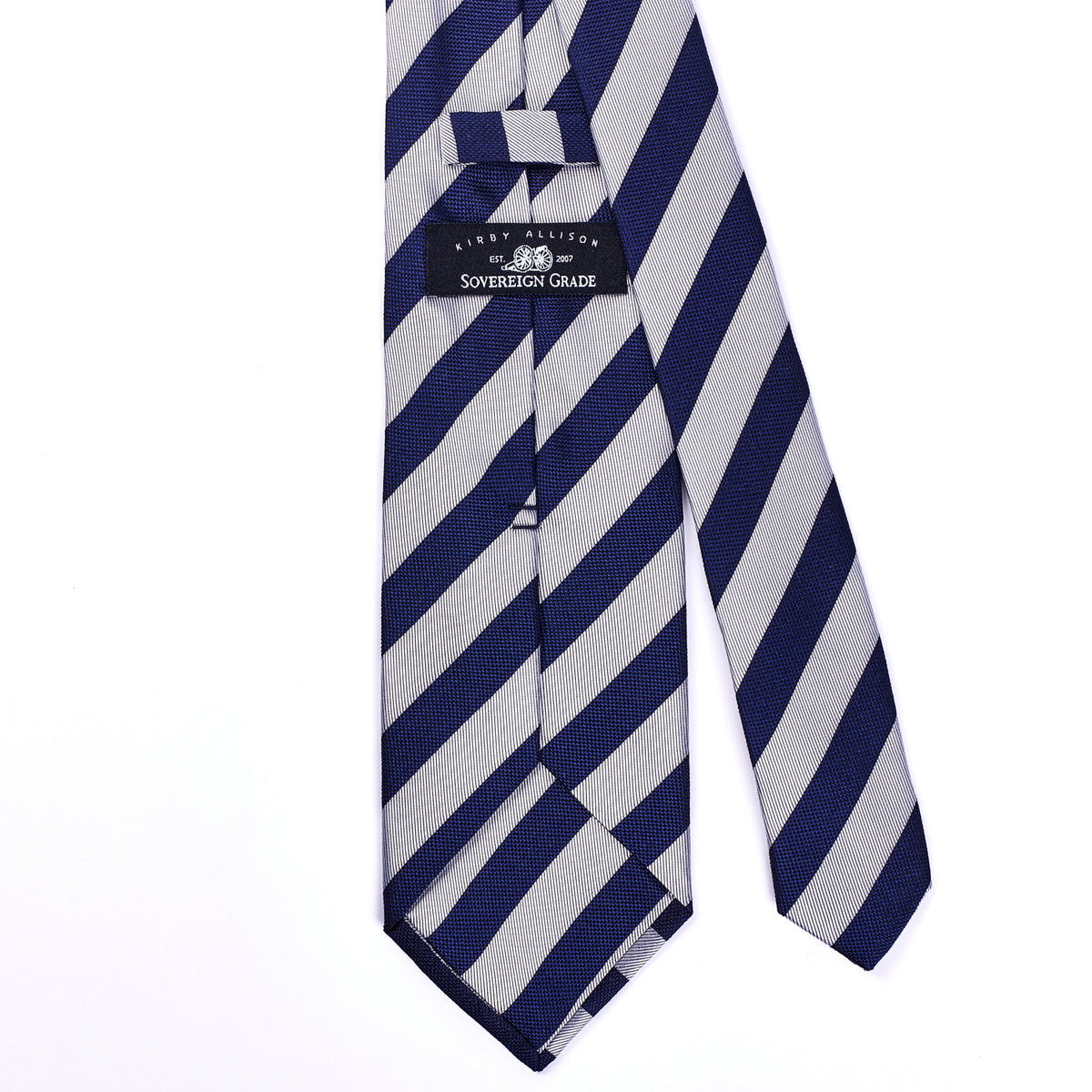 A handmade United Kingdom Sovereign Grade woven navy and silver rep tie, 150 cm, on a white background, from the KirbyAllison.com ties collection.